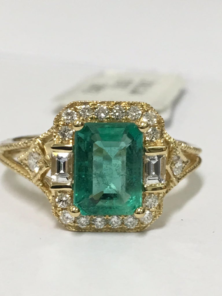 Emerald Diamond Ring Set in 18 Karat Yellow Gold at 1stDibs