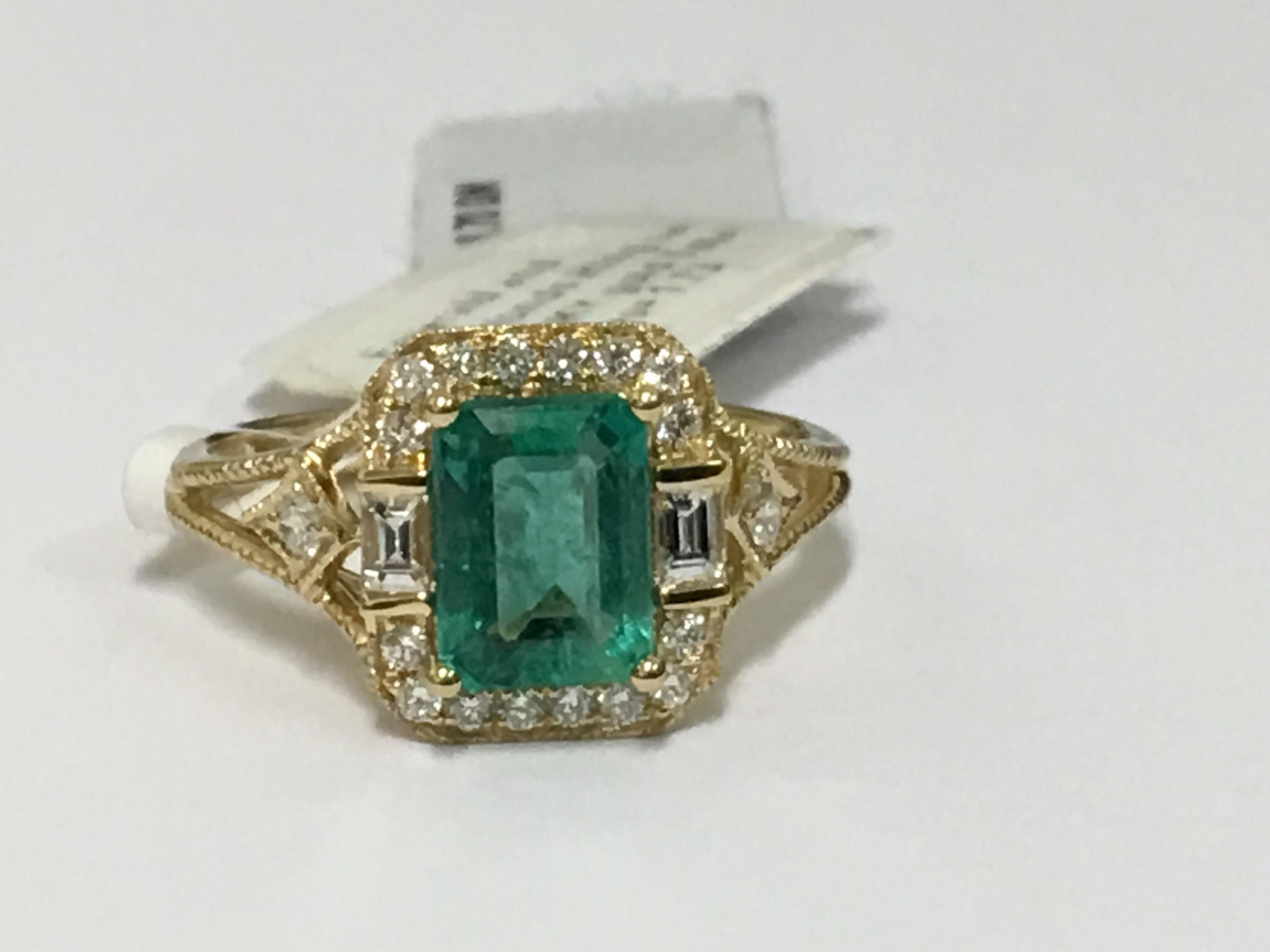 Women's Emerald Diamond Ring Set in 18 Karat Yellow Gold