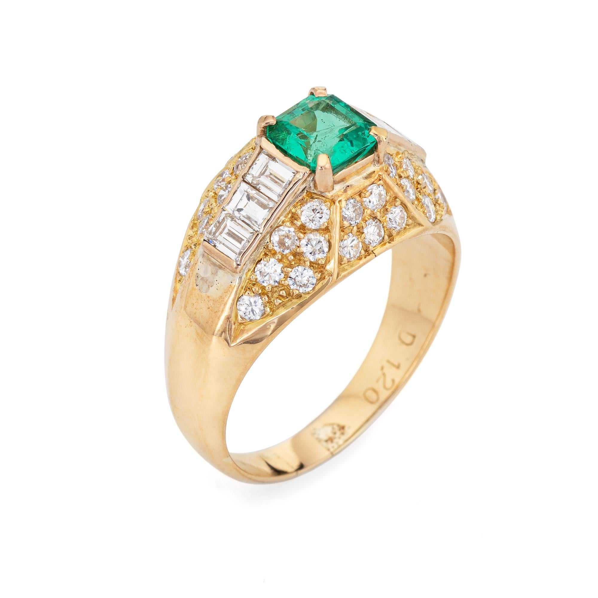 Stylish vintage emerald & diamond ring (circa 1980s to 1990s) crafted in 18 karat yellow gold. 

Emerald cut emerald is estimated at 0.98 carats, accented with an estimated 1.20 carats of mixed cut diamonds (estimated at G-H color and VS2-SI1