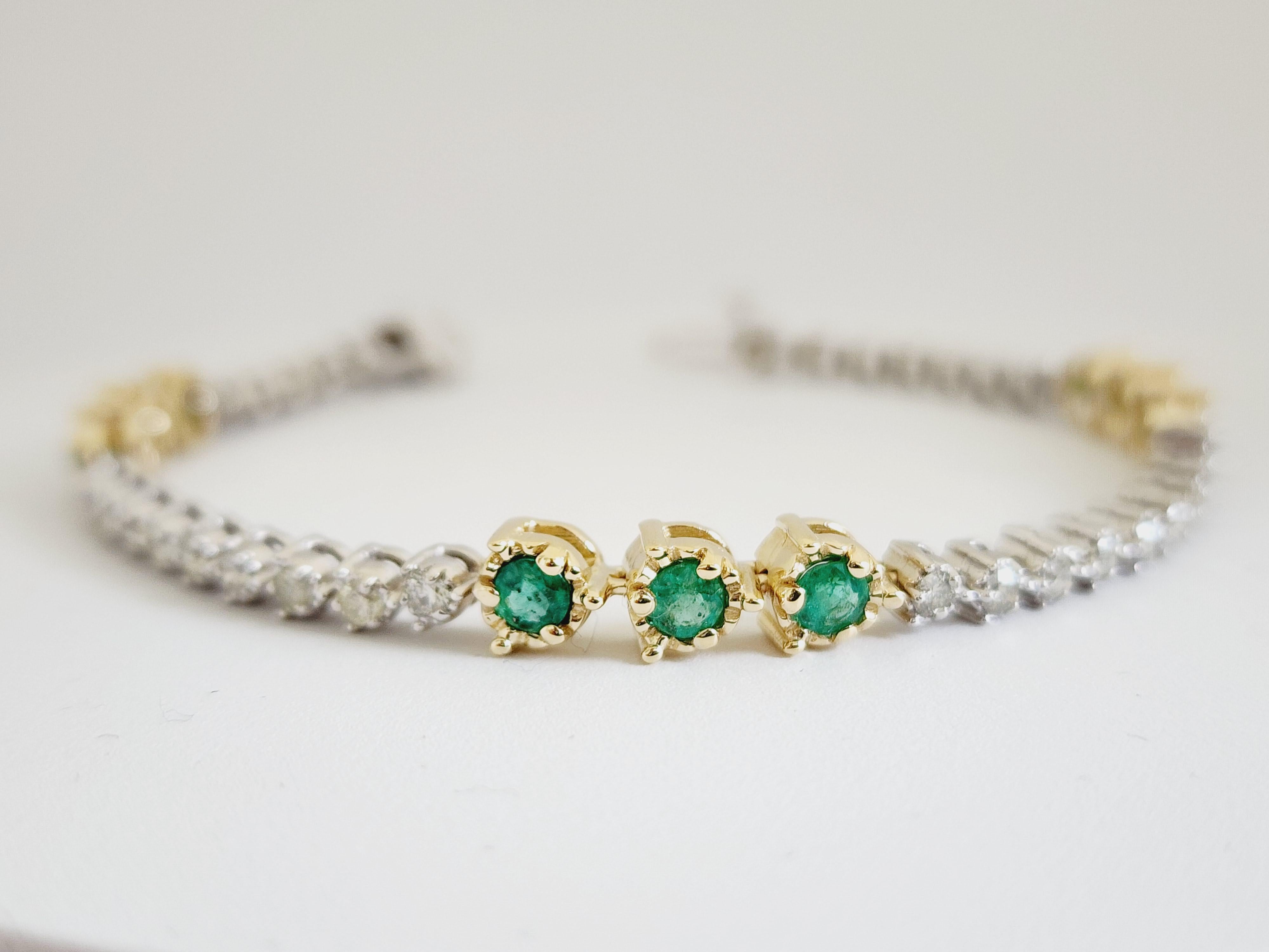 Emerald Diamond Tennis Bracelet 14 Karat Two Tone Gold 7 inch
1.45 cts Natural Emeralds
1.65 cts Natural Diamonds