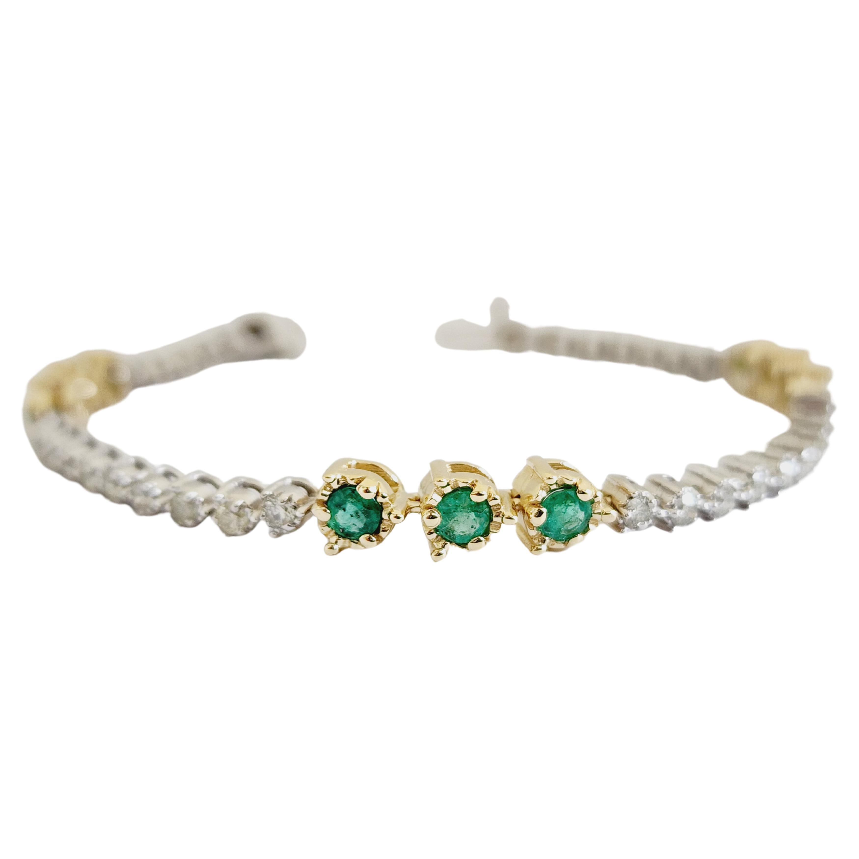 Bracelet tennis en or bicolore 14 carats avec diamants et émeraudes
