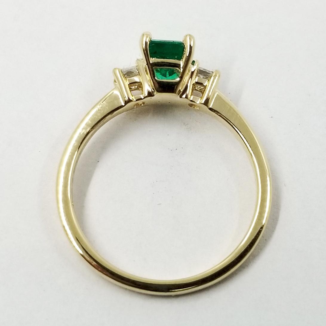 Emerald Cut Emerald and Diamond Three-Stone Ring