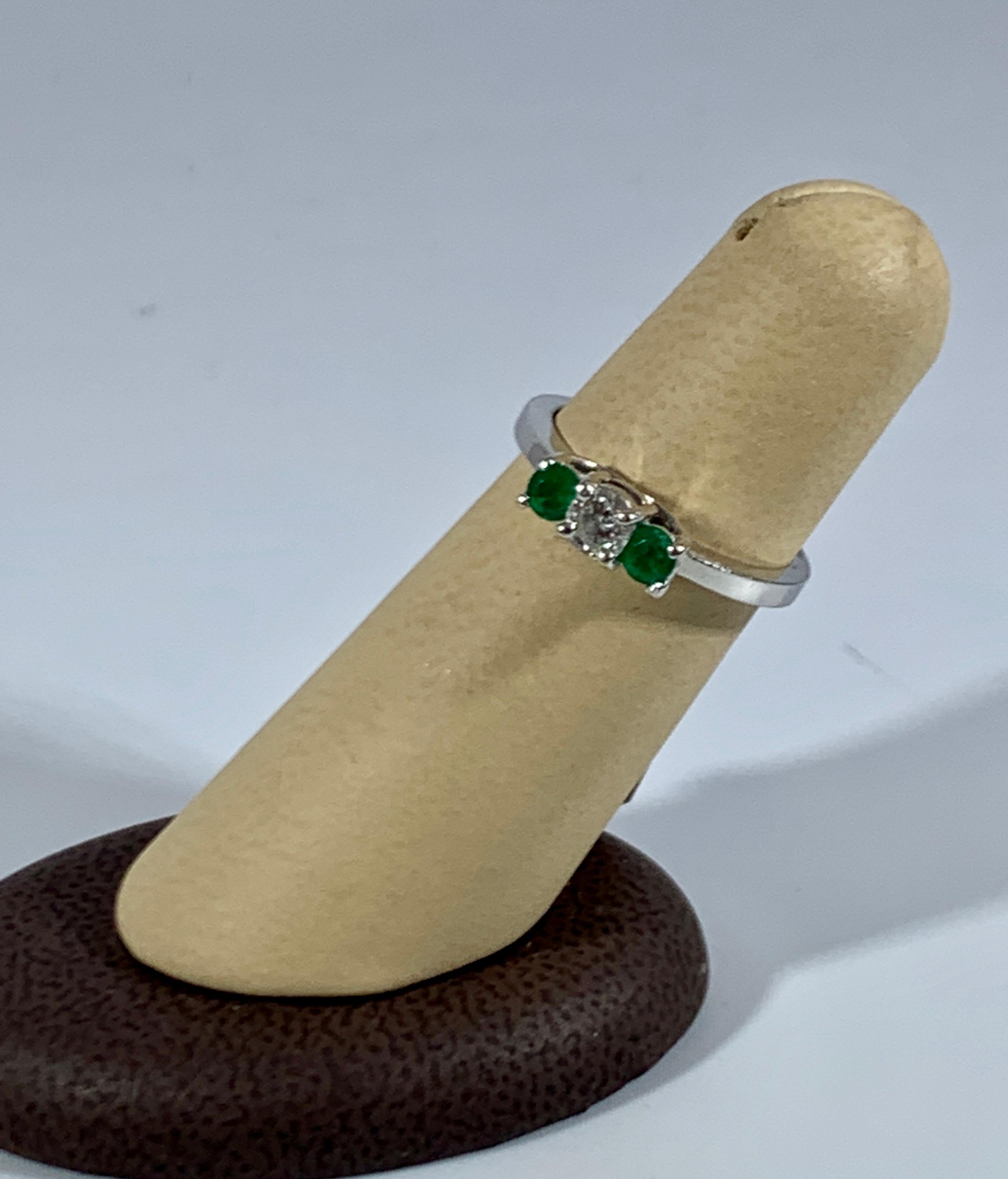Round Cut Emerald and Diamond Three-Stone Ring Past Present Future 14 Karat White Gold