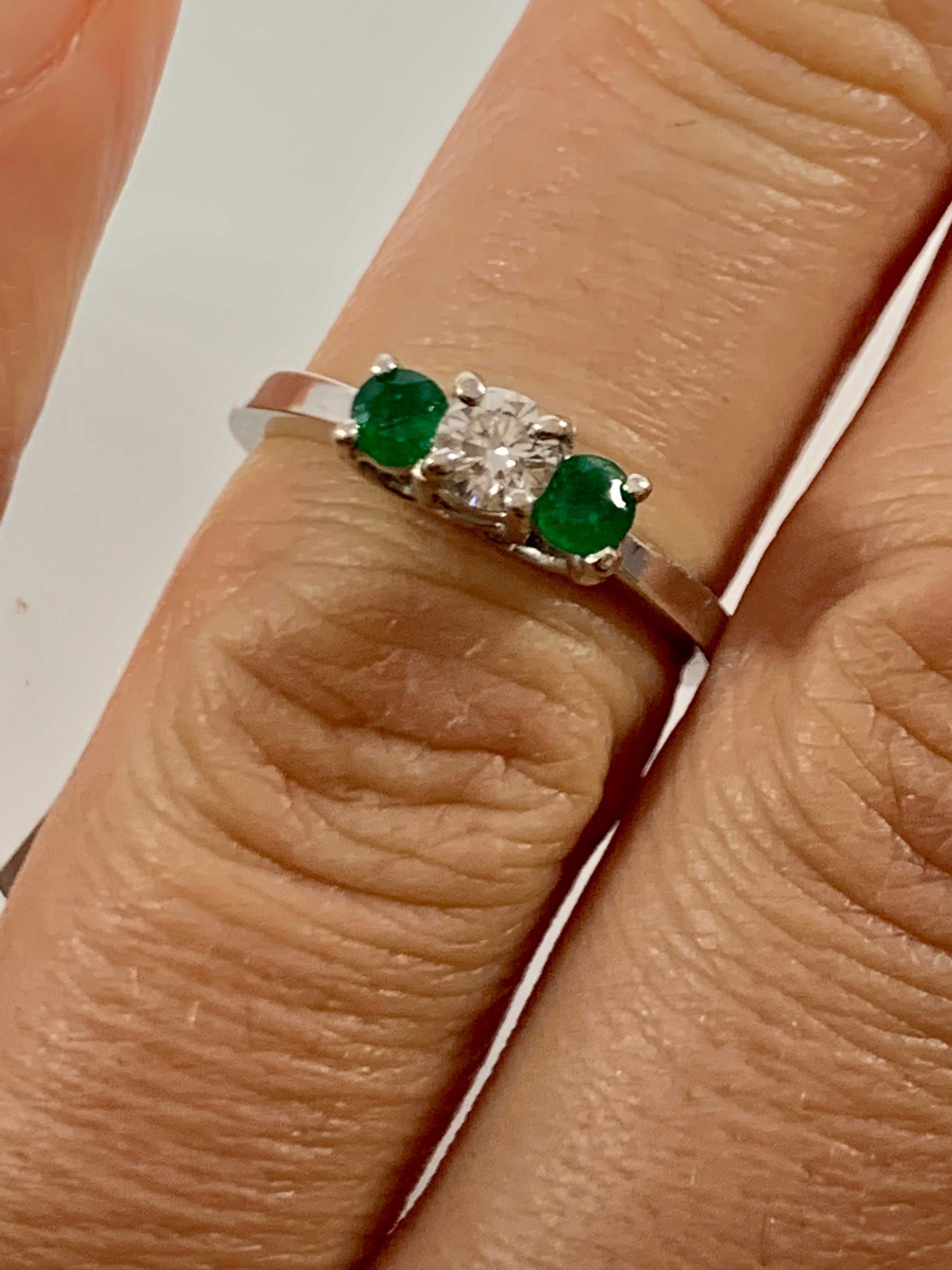 Emerald and Diamond Three-Stone Ring Past Present Future 14 Karat White Gold In Excellent Condition In New York, NY