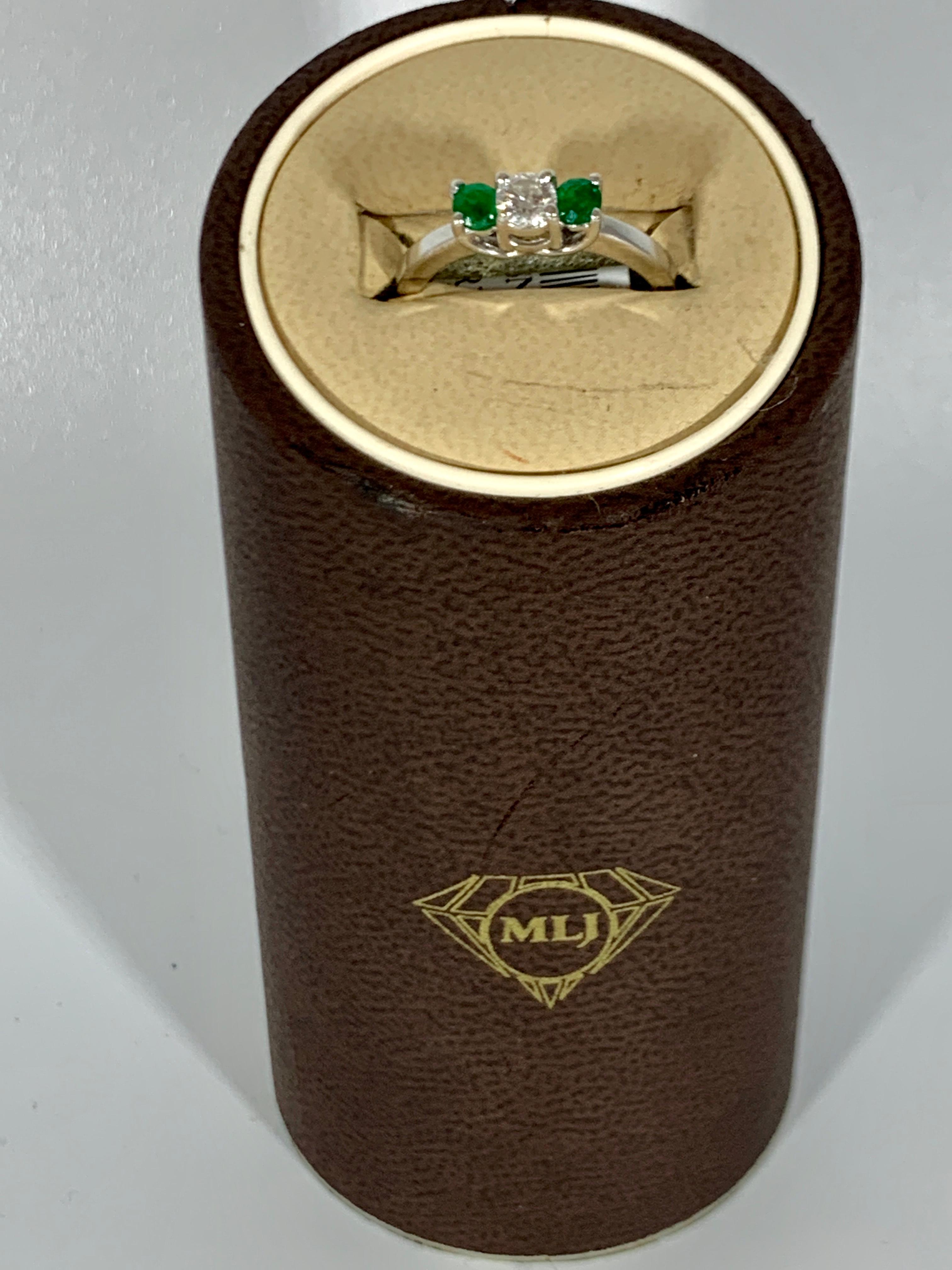 Women's Emerald and Diamond Three-Stone Ring Past Present Future 14 Karat White Gold