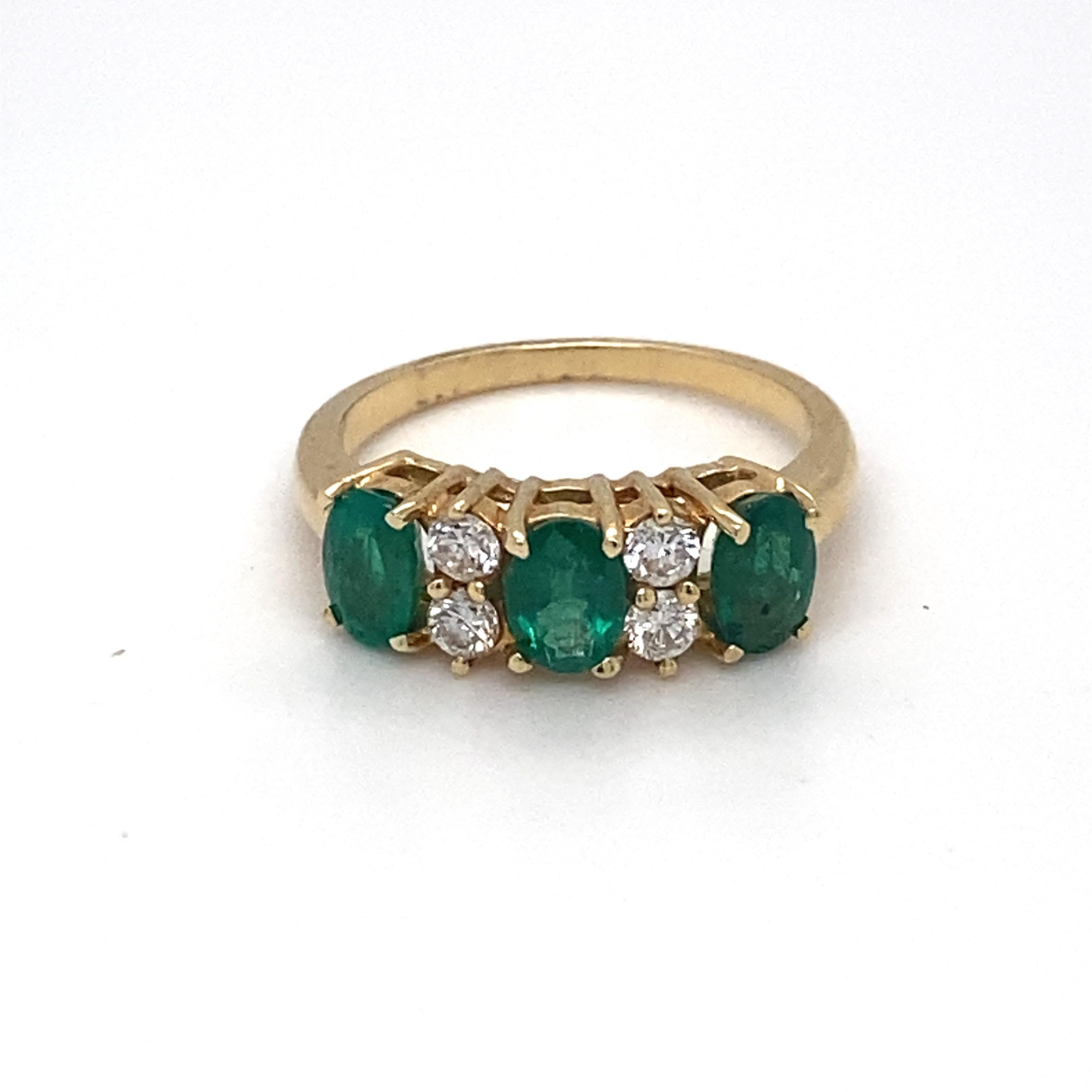 This simple yet elegant ring has three oval cut emeralds accented with diamonds in between to beautify its look. Crafted in 14K yellow gold and is suitable for everyday use. Very comfortable to wear and chic in style!
Weight of Emerald: 2.00 carat