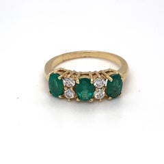 Emerald Diamond Three Stone Yellow Gold Ring