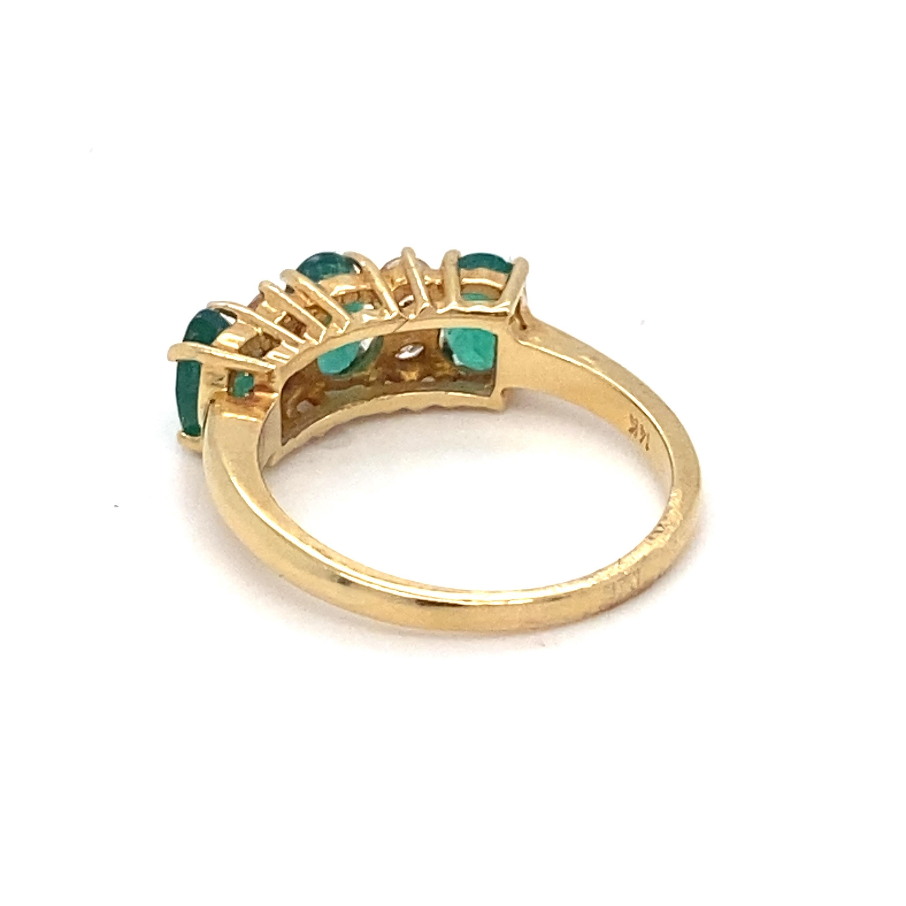 Women's Emerald Diamond Three Stone Yellow Gold Ring For Sale