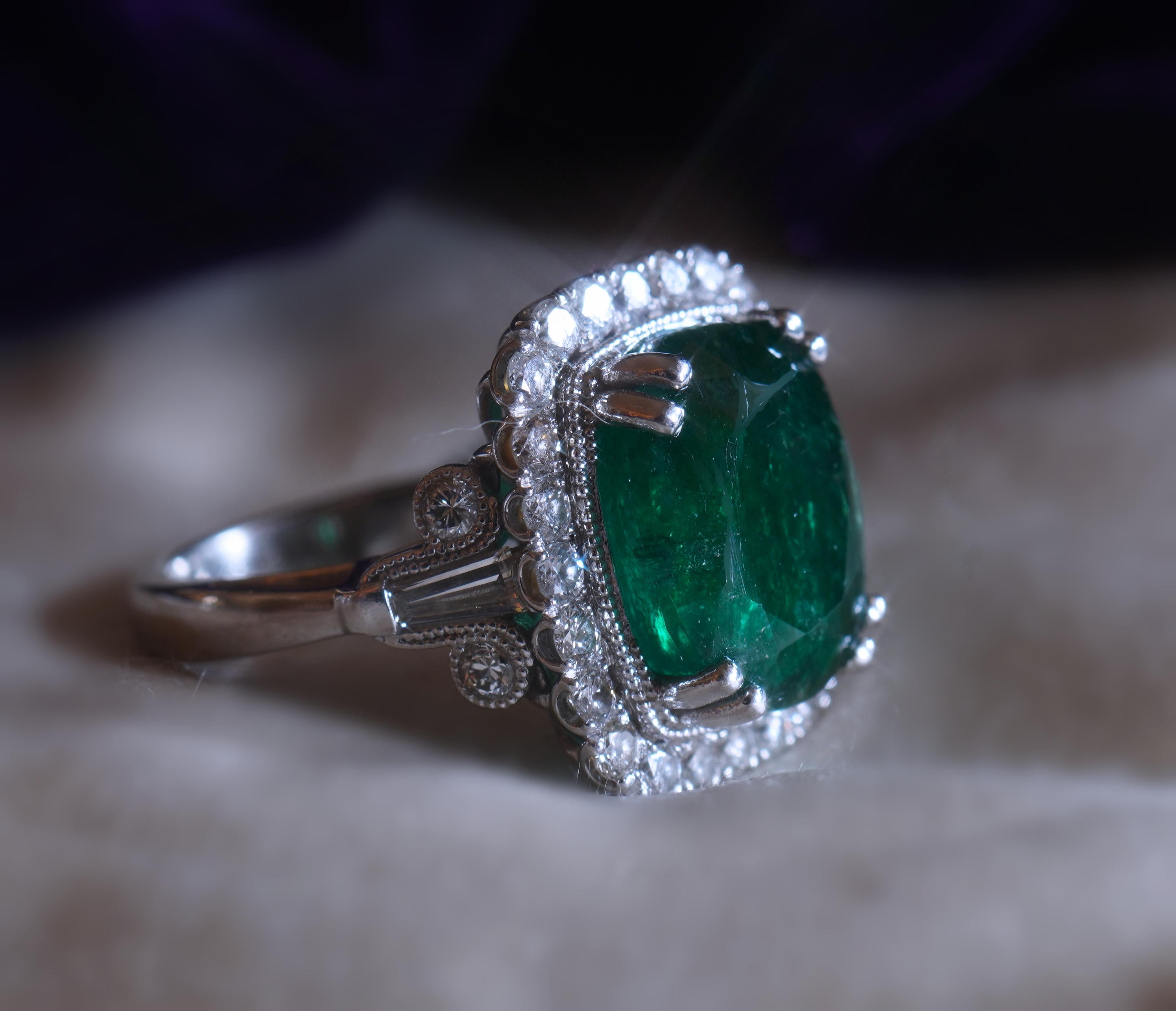 Old South Jewels proudly presents...VINTAGE LUXURY.     HUGE PLATINUM VINTAGE 9.16 CARAT EMERALD DIAMOND CERTIFIED RING!   VINTAGE GLOWING 7.65 CARAT TRANSPARENT/ SEMITRANSPARENT NATURAL EMERALD.  CROWNED WITH 1.51 CARATS OF VS SPARKLING WHITE EYE