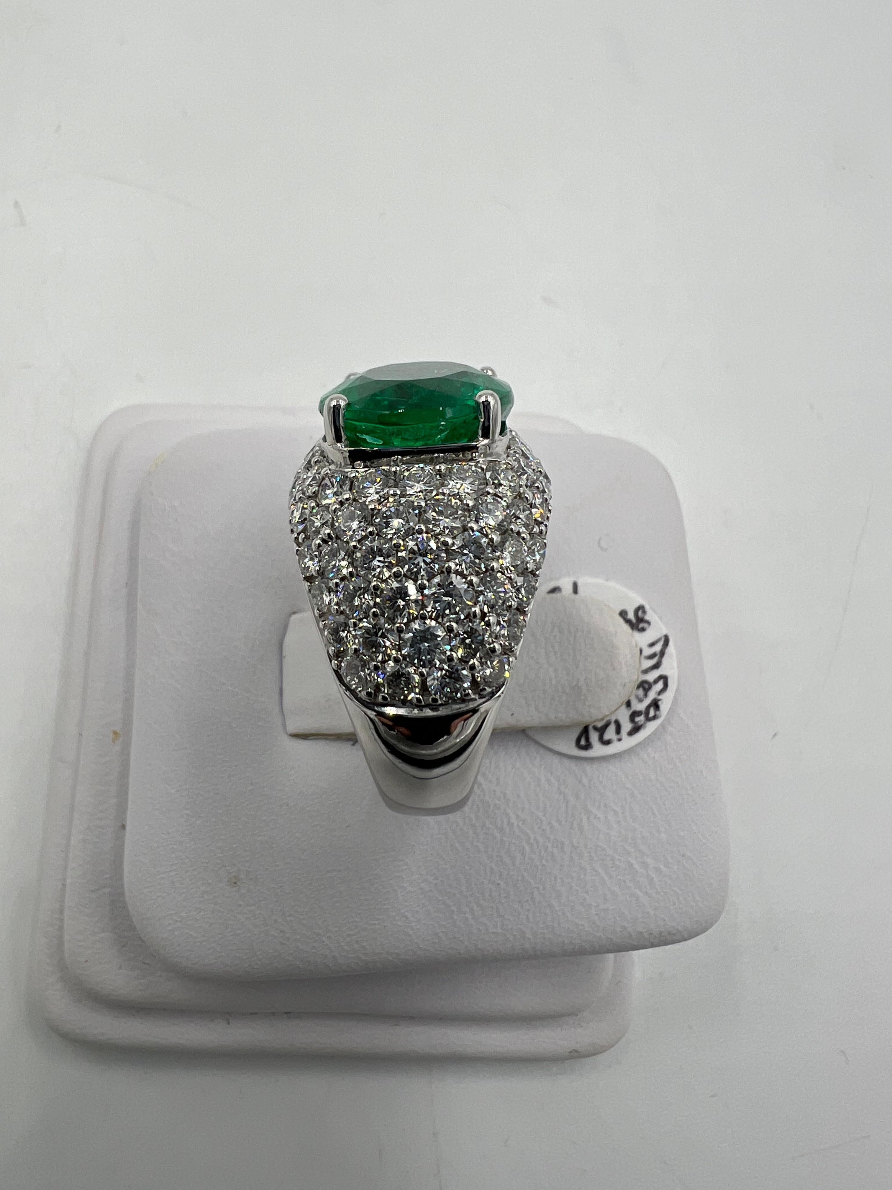 Oval Cut Emerald Diamond White Gold Dome Ring For Sale
