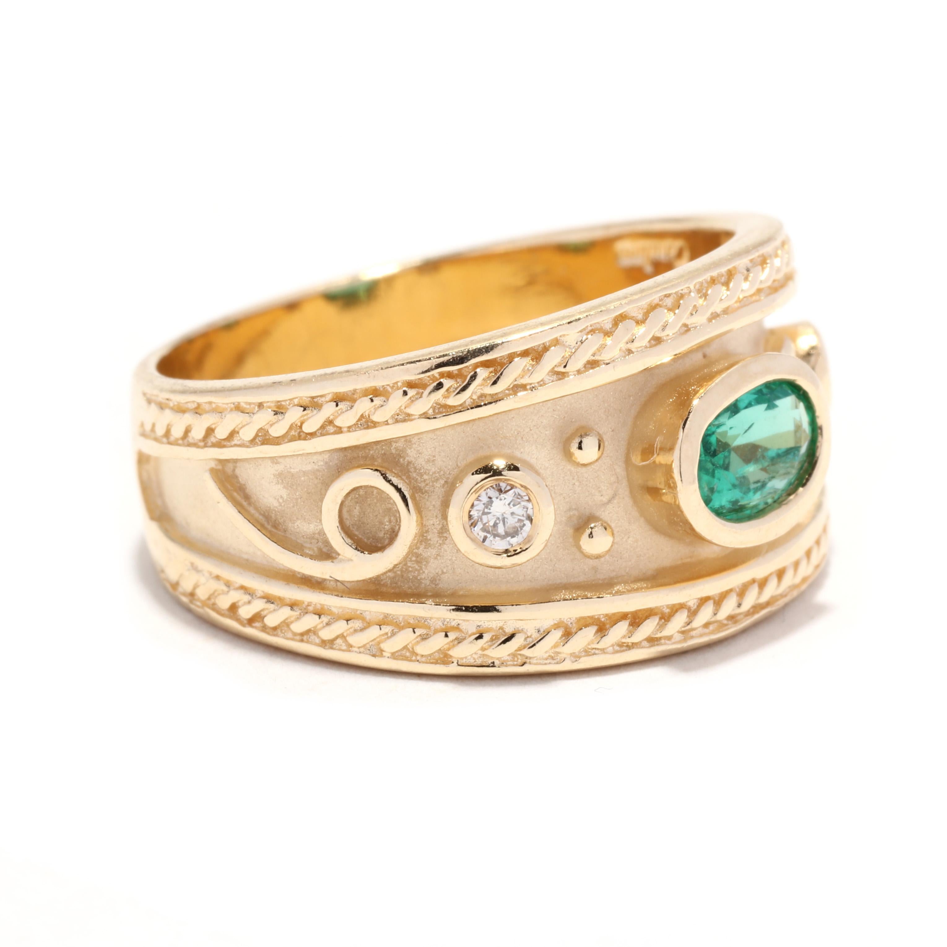 Ein Vintage 14 Karat Gelbgold Smaragd und Diamanten breite Band Ring. Diese byzantinischen Stil Ring verfügt über eine Lünette gesetzt, oval geschliffenen Smaragd mit einem Gewicht von ca. .50 Karat mit einer Lünette gesetzt Runde Brillantschliff