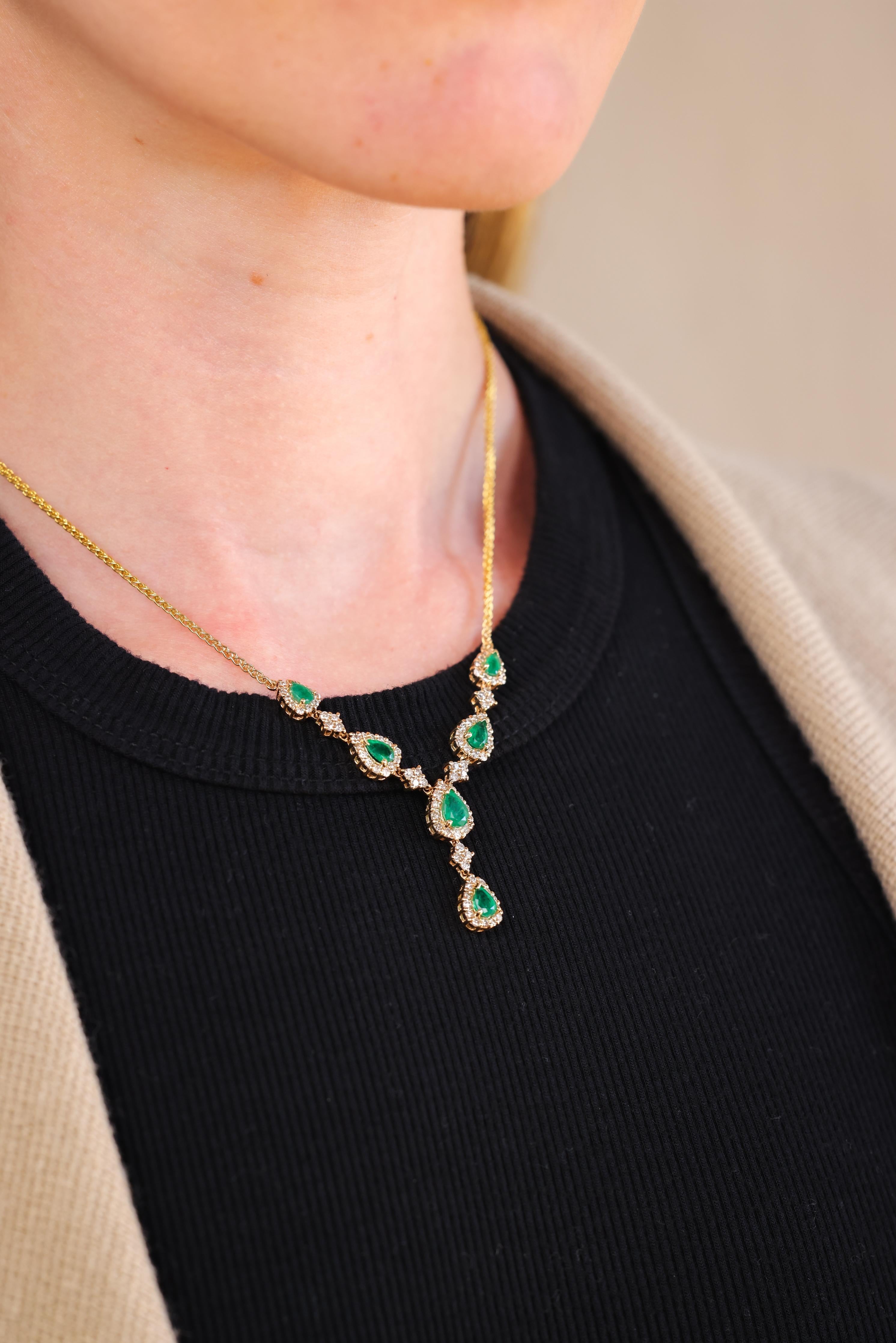 6 pear shape emerald weighing approximately 3.8 carats 
93 round brilliant cut diamonds approximately 0.70 carat 
H-I color
included
14k yellow gold 
circa 1980s 
17.5 inches long 

This exquisite necklace from the 1980s combines classic elegance