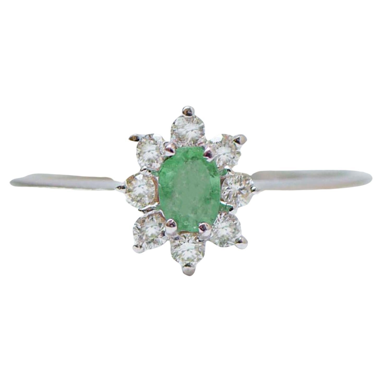 Emerald, Diamonds, 18 Karat White Gold Modern Ring.