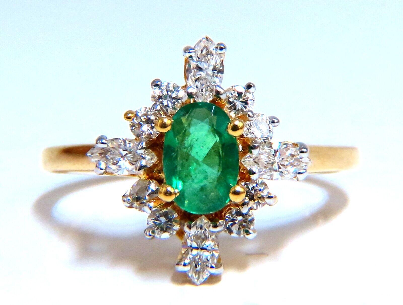 .60ct Natural Oval emerald ring.

6x4mm emerald, even green clean clarity and transparent.

.60 carat natural marquise & round diamond

H-I color Vs-2 Si-1 clarity

14 karat yellow gold 3.5 grams

Depth of ring 8 mm

Size 5.75 we may resize please