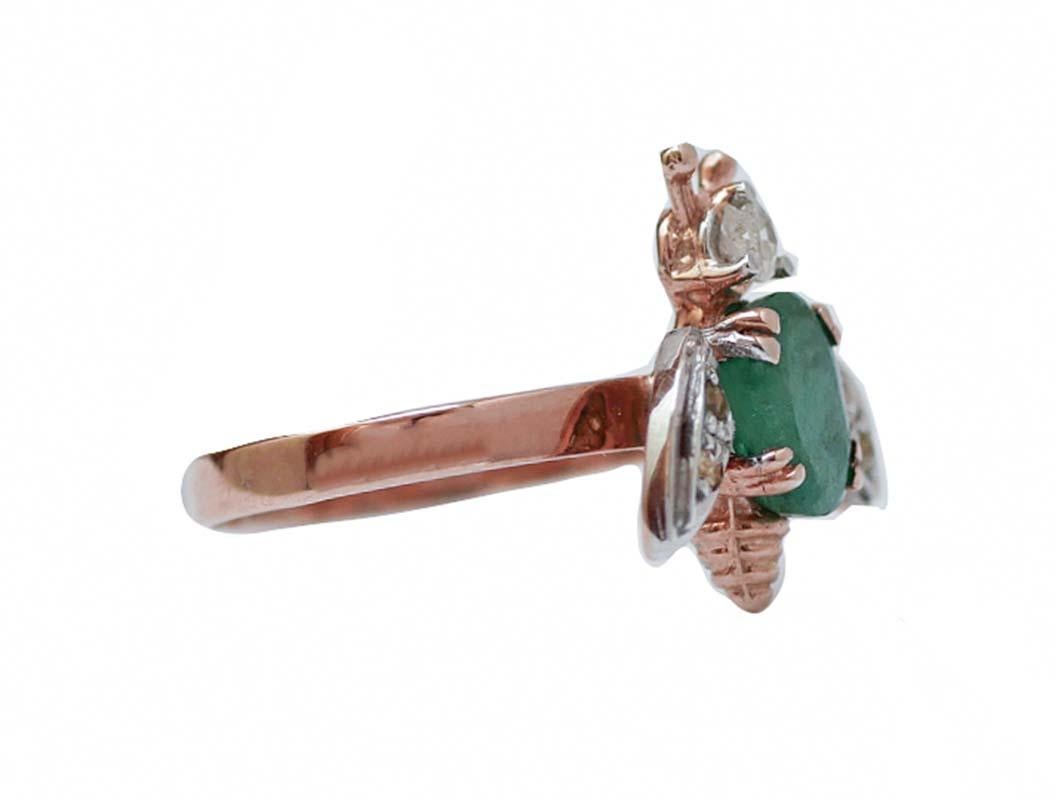 Fly shape ring in 9 karat rose gold and silver structure mounted with a diamond as head, an emerald as body and wings studded with diamonds.
This ring was totally handmade by Italian master goldsmiths and it is in perfect conditions.
Diamonds 0.32