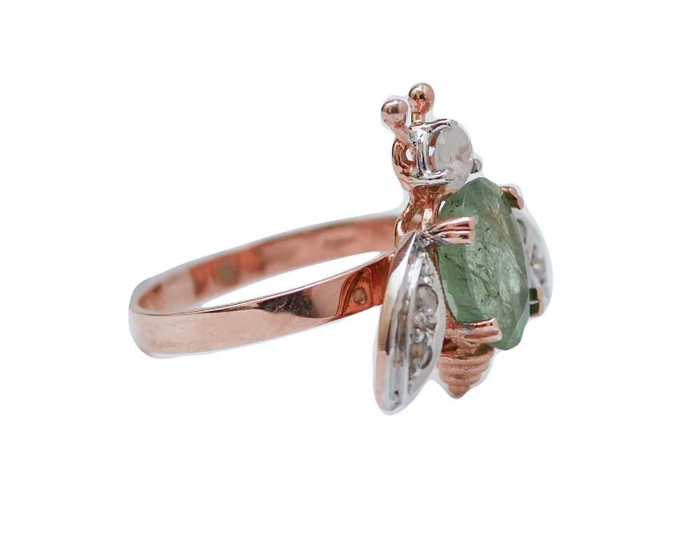 Particular fly shape ring in 9 karat rose gold and silver structure mounted with a diamond as head, an emerald as body and wings studded with diamonds.
This ring was totally handmade by Italian master goldsmiths and it is in perfect
