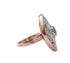 Bague en or rose, émeraude, diamants