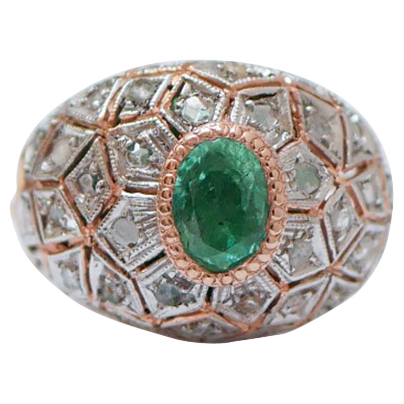 Anello con smeraldo, diamanti, oro rosa e argento. in vendita