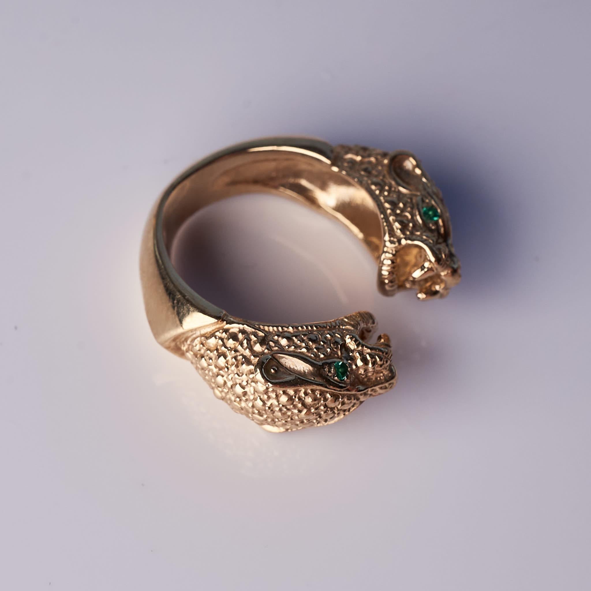 Contemporary Emerald Double head Jaguar Ring For Sale