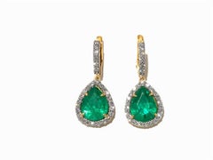 Emerald Drops and Diamonds Earring in 18 Karat Yellow Gold