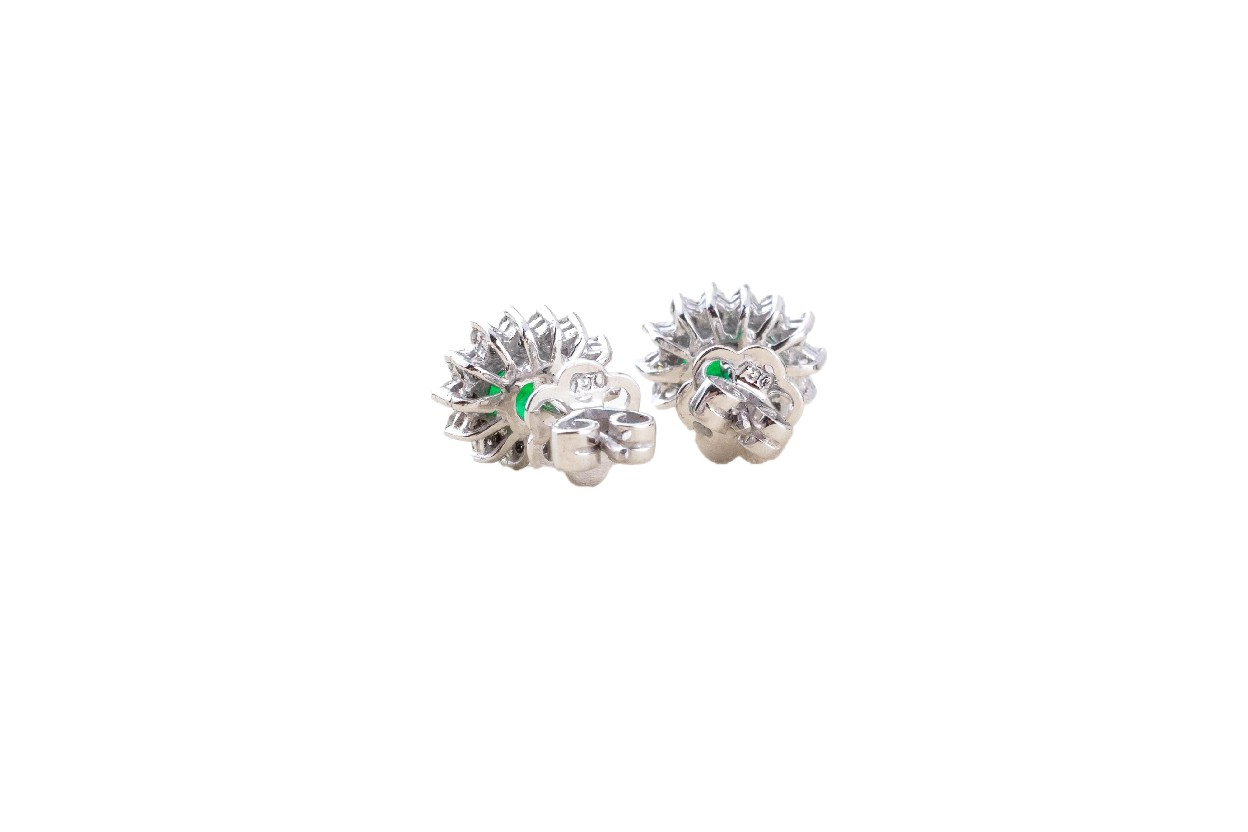 Emerald earrings with diamonds
18 k white gold
hallmarked 