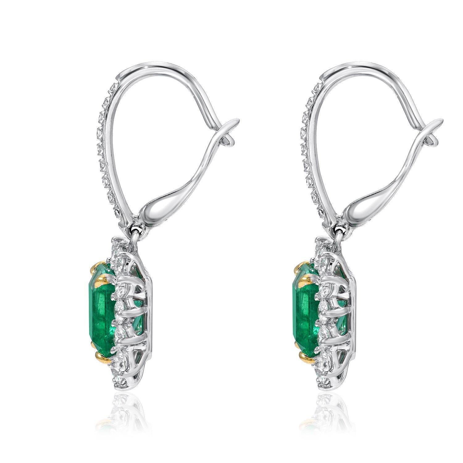 Emerald cut Colombian Emerald, lever-back earrings, featuring a pair of 2.68 carats total Emeralds, and a total of 1.20 carats round brilliant diamonds, in 18K white and yellow gold.
Returns are accepted and paid by us within 7 days of