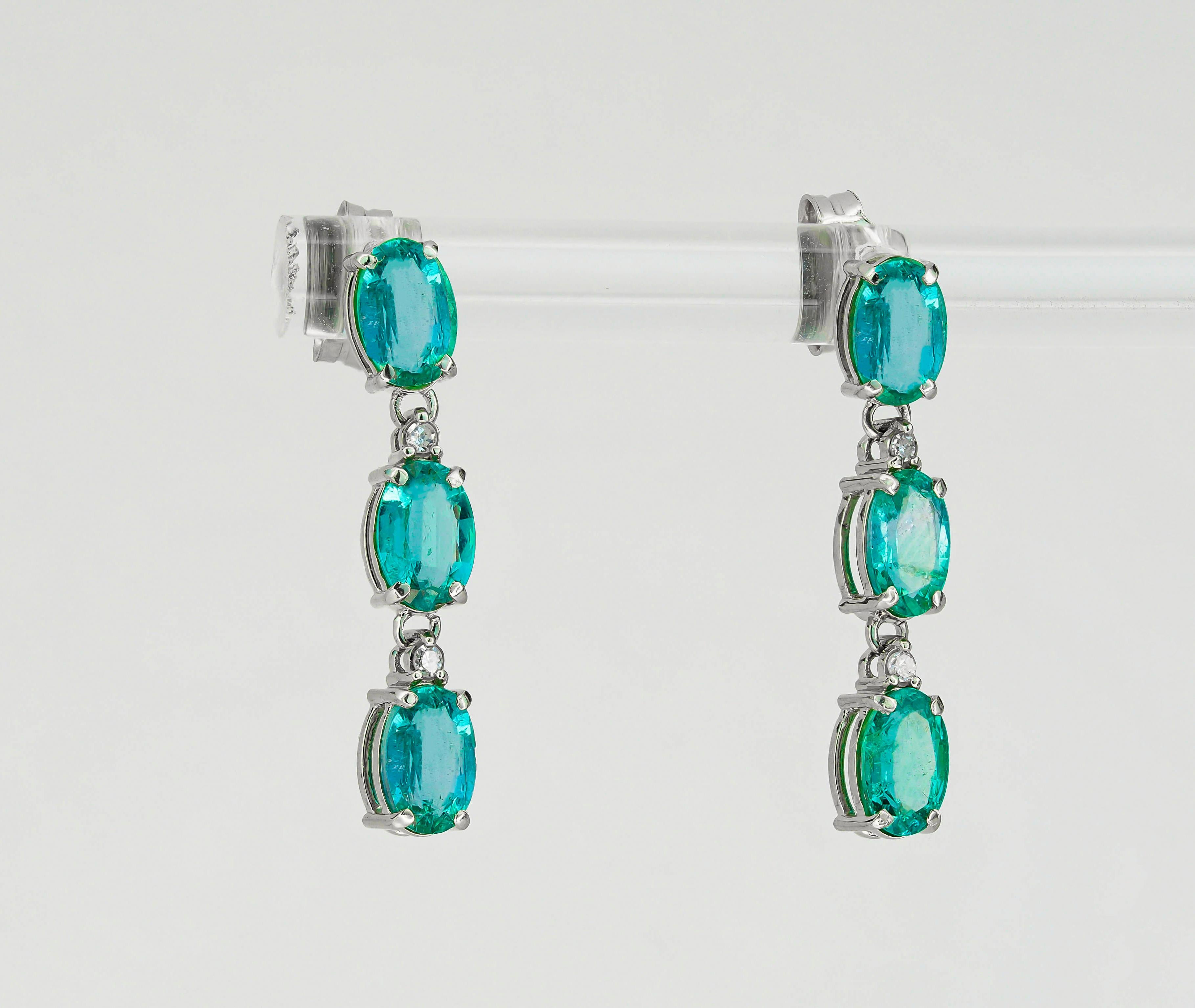 14 karat gold earrings studs with genuine emeralds. May birthstone jewelry. Oval emerald earrings. Green gemstone earrings. Statement emerald earrings. Emerald drop earrings.

Metal: 14 karat gold
Earrings size: 23.7 x 5.4 mm.
Weight: 2.4
