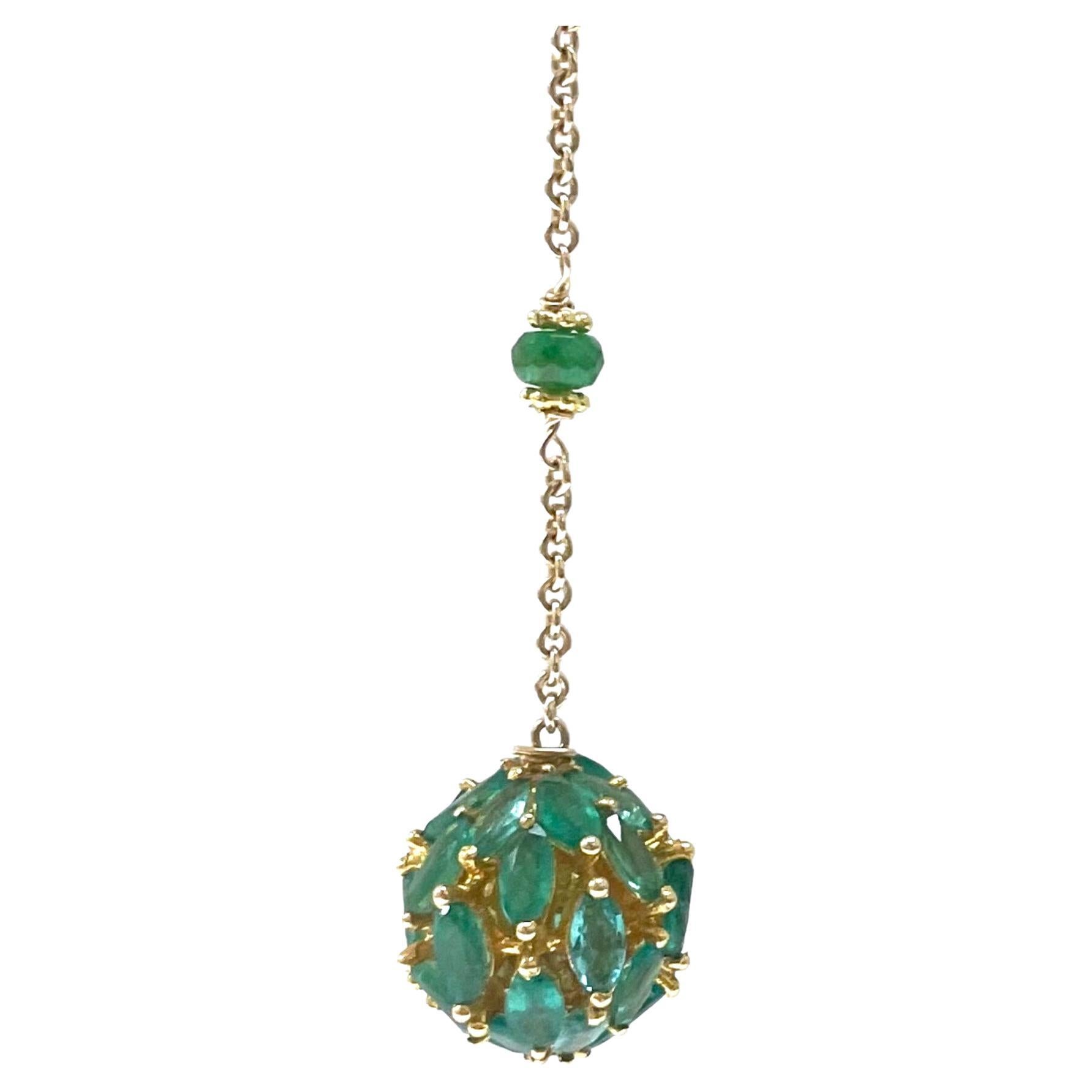 Description
Stunning and fashionable marquis set Emerald balls suspended from pave diamond stud and a chain accented with green Tsavorite. Item #E3354
Check out matching Necklace (see photo) Item # N3747, $4,150.

Materials and Weight
Emeralds 5
