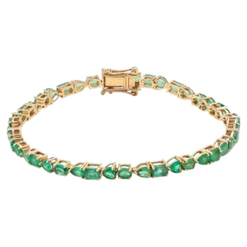 6.73ct Emerald Yellow Gold Tennis Bracelet For Sale