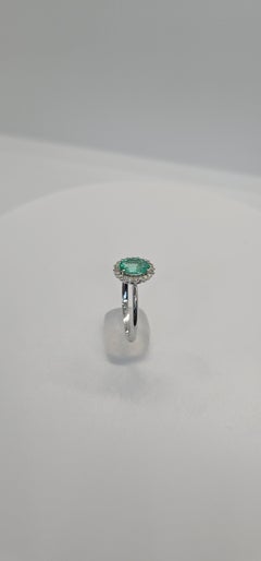 0.53 carat Natural Emerald Elegance: A Diamond-Encrusted Masterpiece