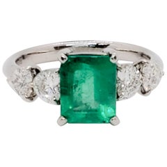 Emerald Emerald Cut and White Diamond Heart Ring in Platinum