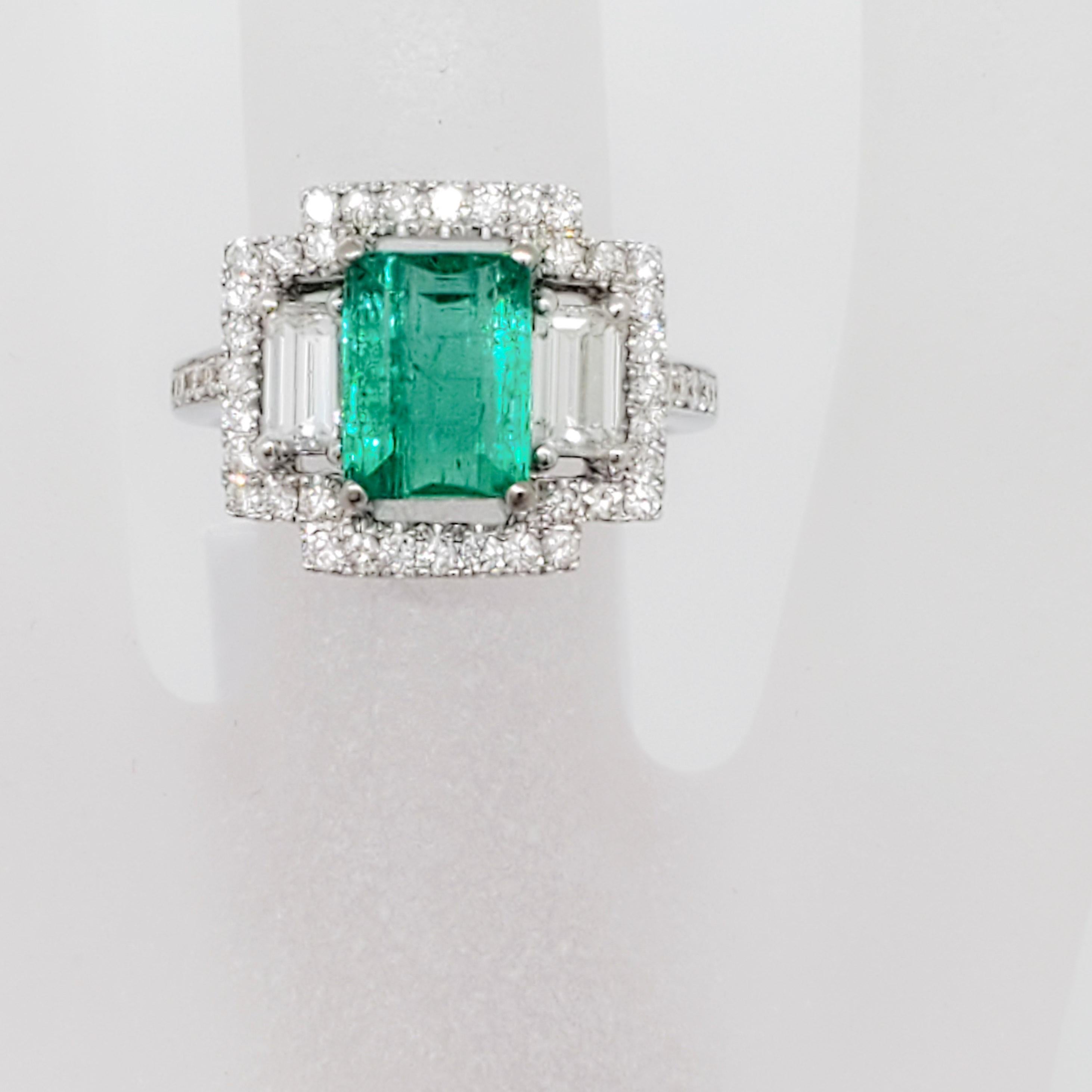 Emerald Emerald Cut and White Diamond Three-Stone Ring in 18 Karat White Gold In New Condition In Los Angeles, CA
