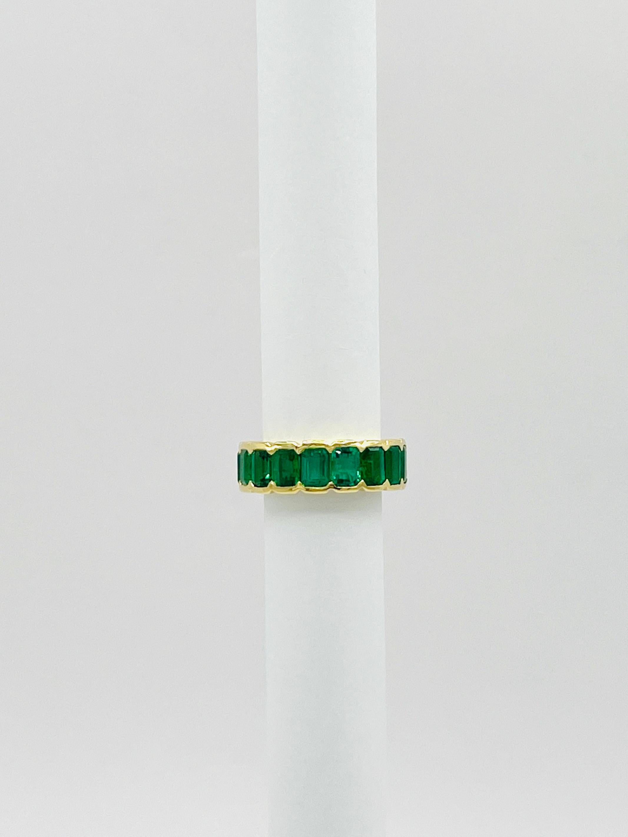 Emerald Emerald Cut Eternity Band Ring in 18K Yellow Gold For Sale 4