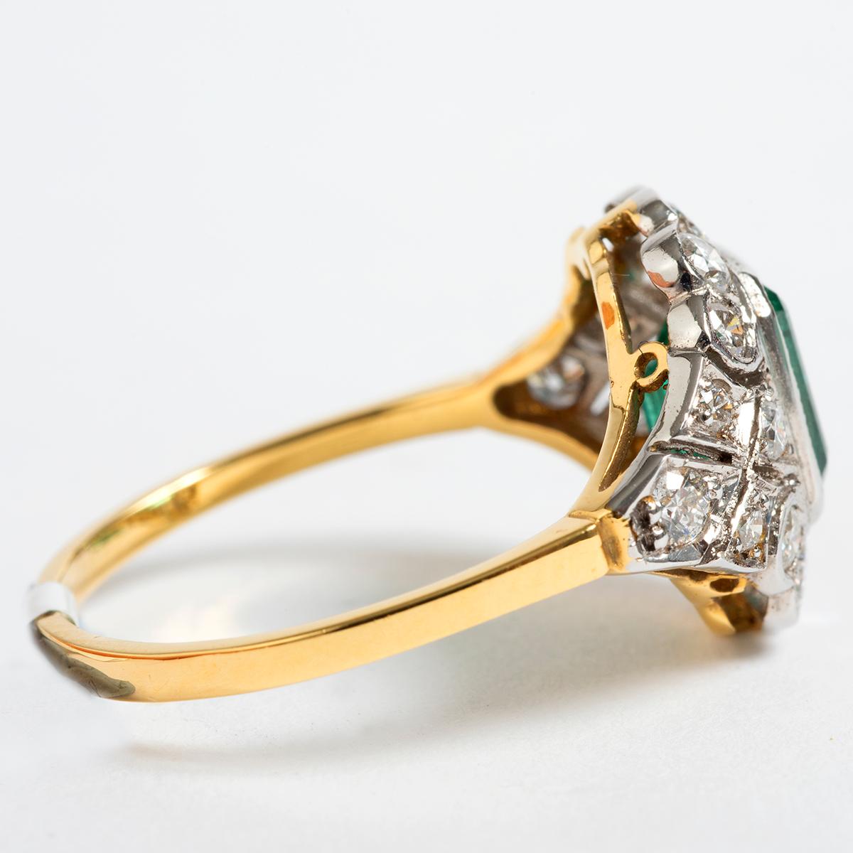 This beautifully designed emerald and diamond cluster ring from the 1970's is set in 18K Yellow Gold. Emeralds are est 1.20ct and diamonds est .60ct in weight. This ring comes in UK size N / US size 6.75. A perfect gift for her... Year circa 1970.