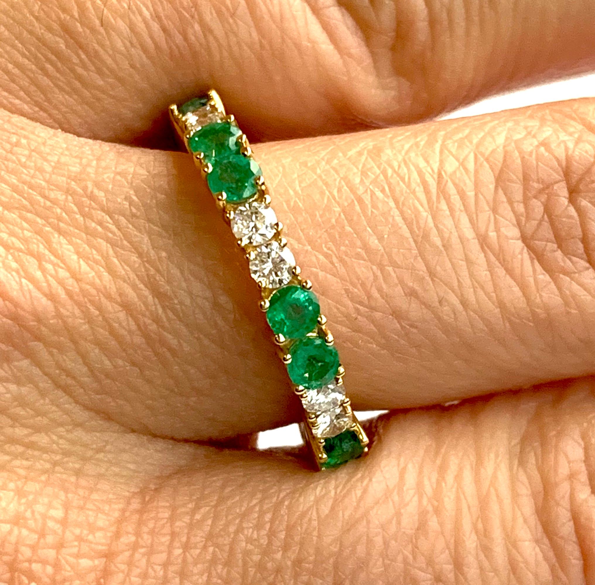 Contemporary Emerald Eternity Band in Yellow Gold