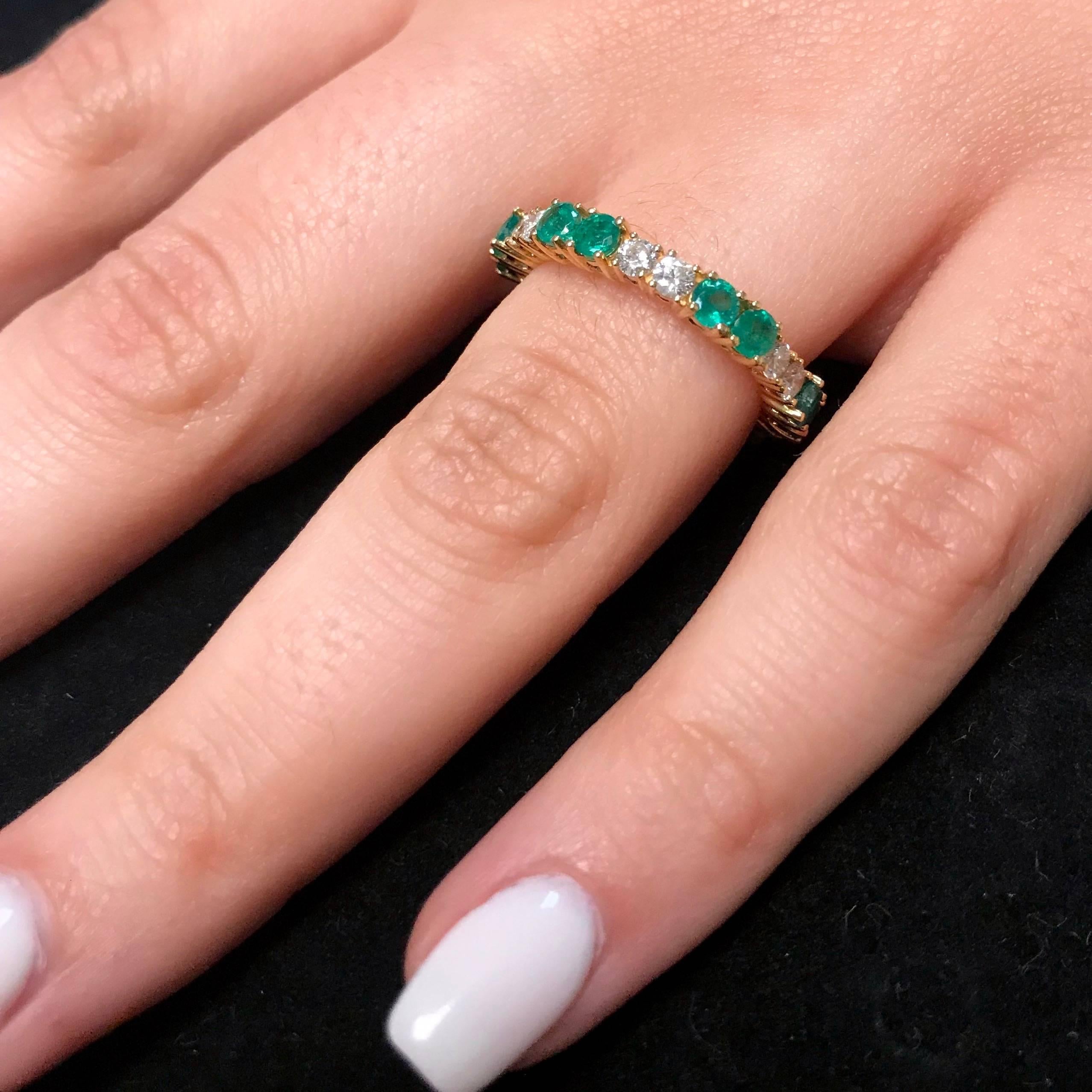Women's Emerald Eternity Band in Yellow Gold