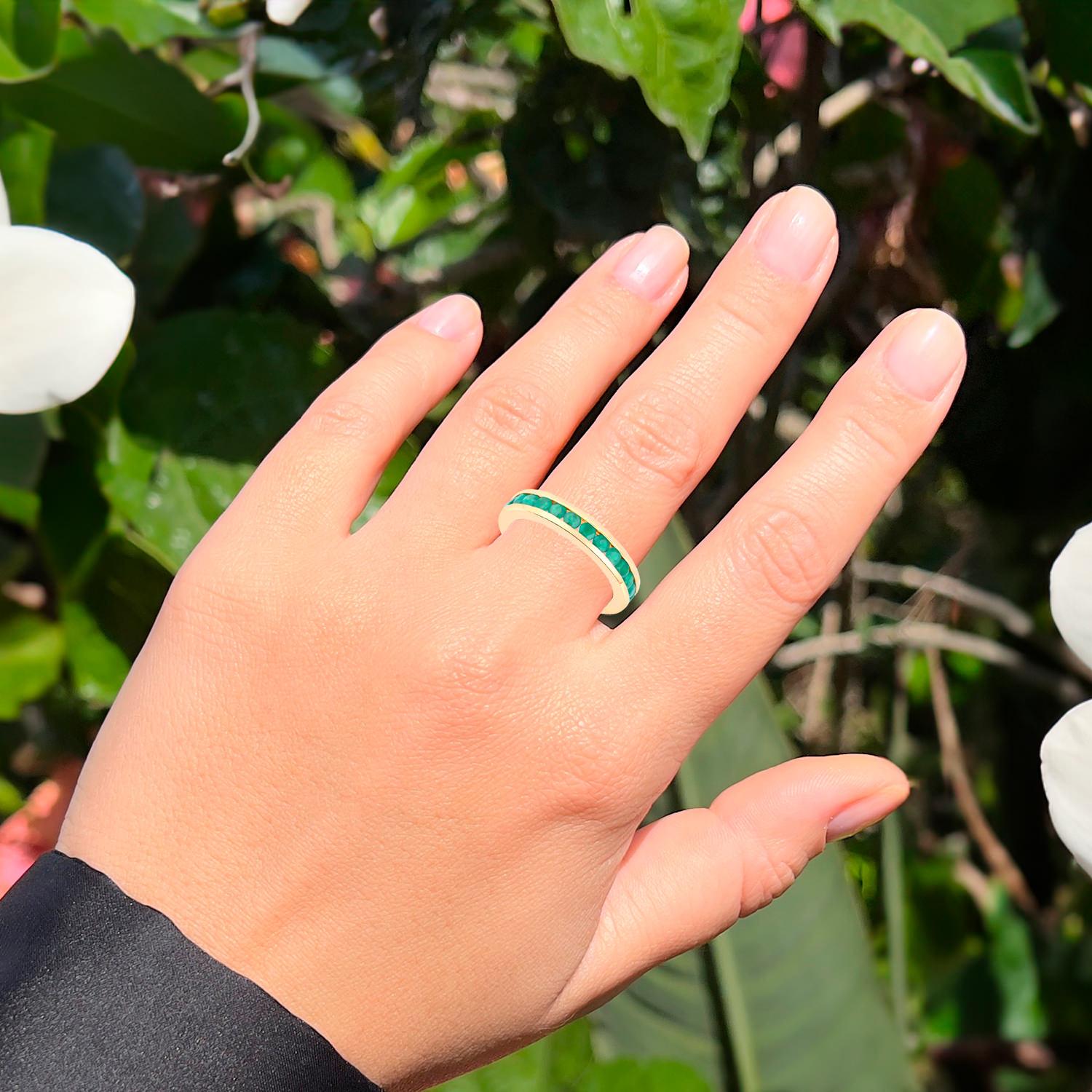 Contemporary Emerald Eternity Band Ring 1.43 Carats 14K Yellow Gold For Sale