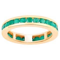 Bague d'éternité émeraude 1,43 carats or jaune 14 carats