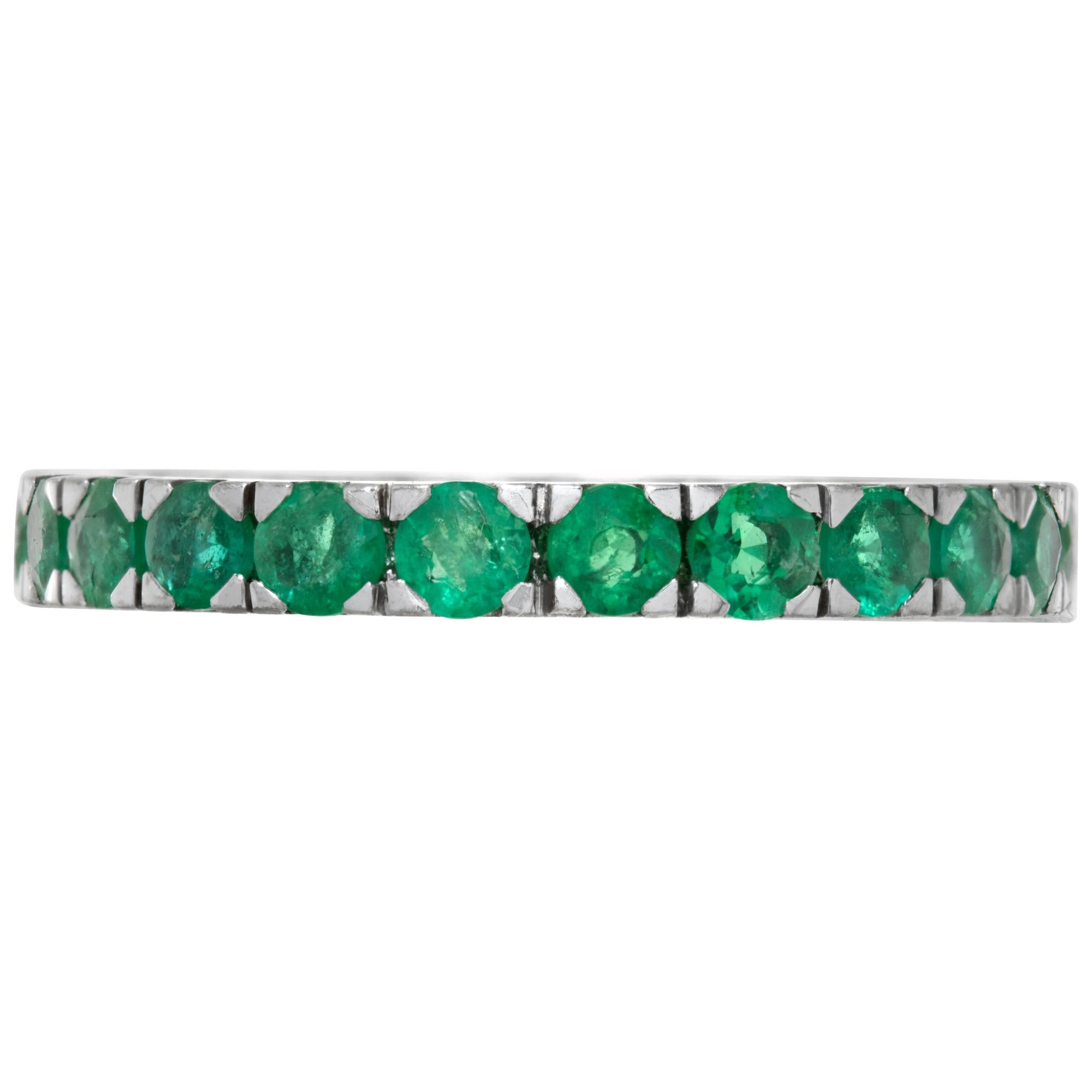 Emerald eternity band with approximately 1.50 carats in green emeralds set in 18k white gold. Size 10

This Emerald ring is currently size 10 and some items can be sized up or down, please ask! It weighs 2 pennyweights and is 18k White Gold.
