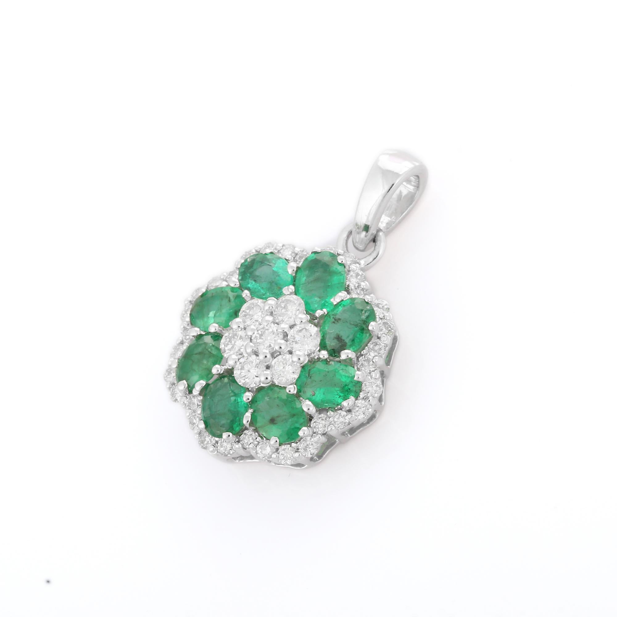 Natural Floral Emerald pendant in 18K Gold. It has a oval cut emerald studded with diamonds that completes your look with a decent touch. Pendants are used to wear or gifted to represent love and promises. It's an attractive jewelry piece that goes