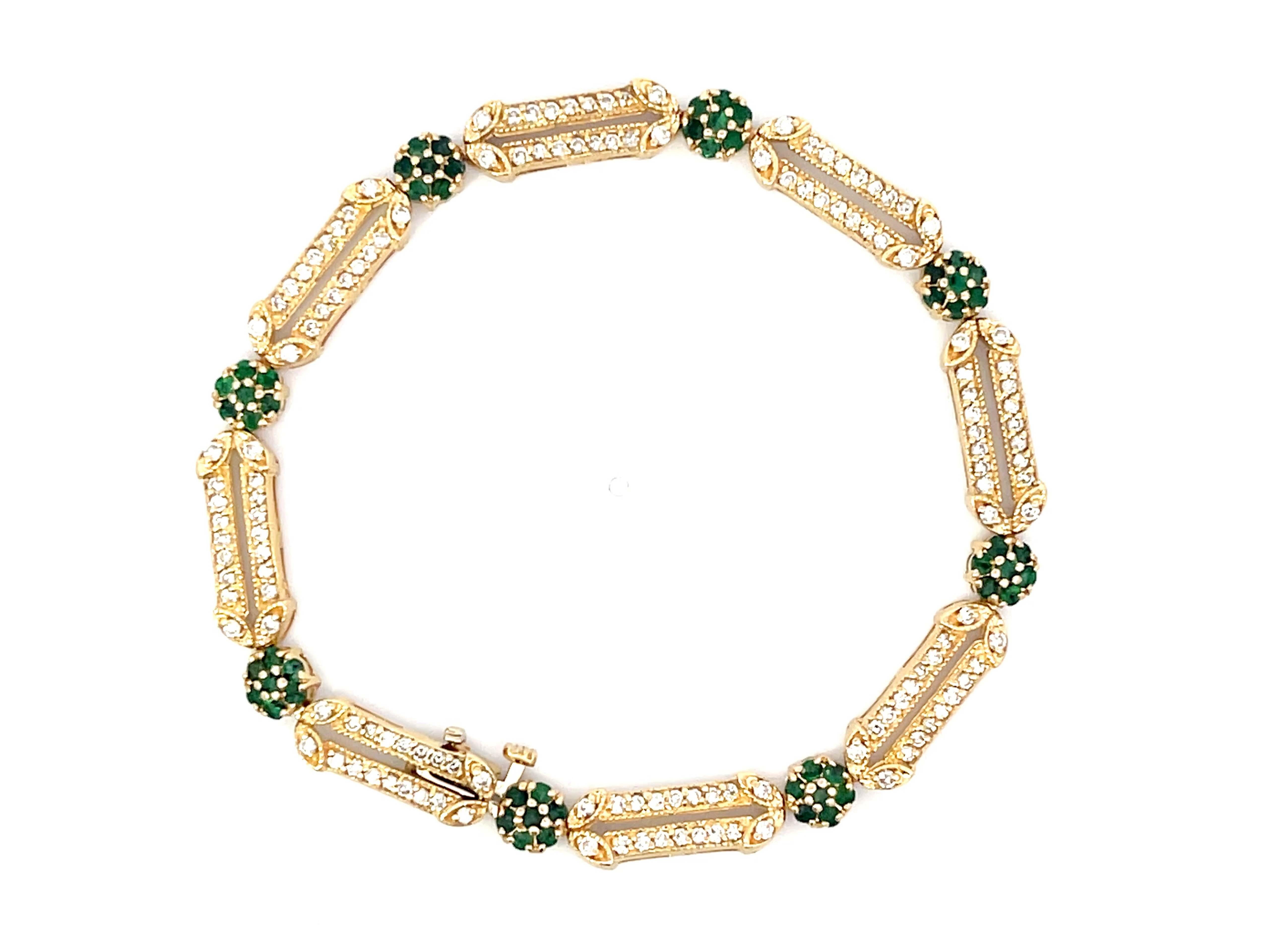 Modern Emerald Flower and Diamond Link Bracelet in 14k Yellow Gold For Sale