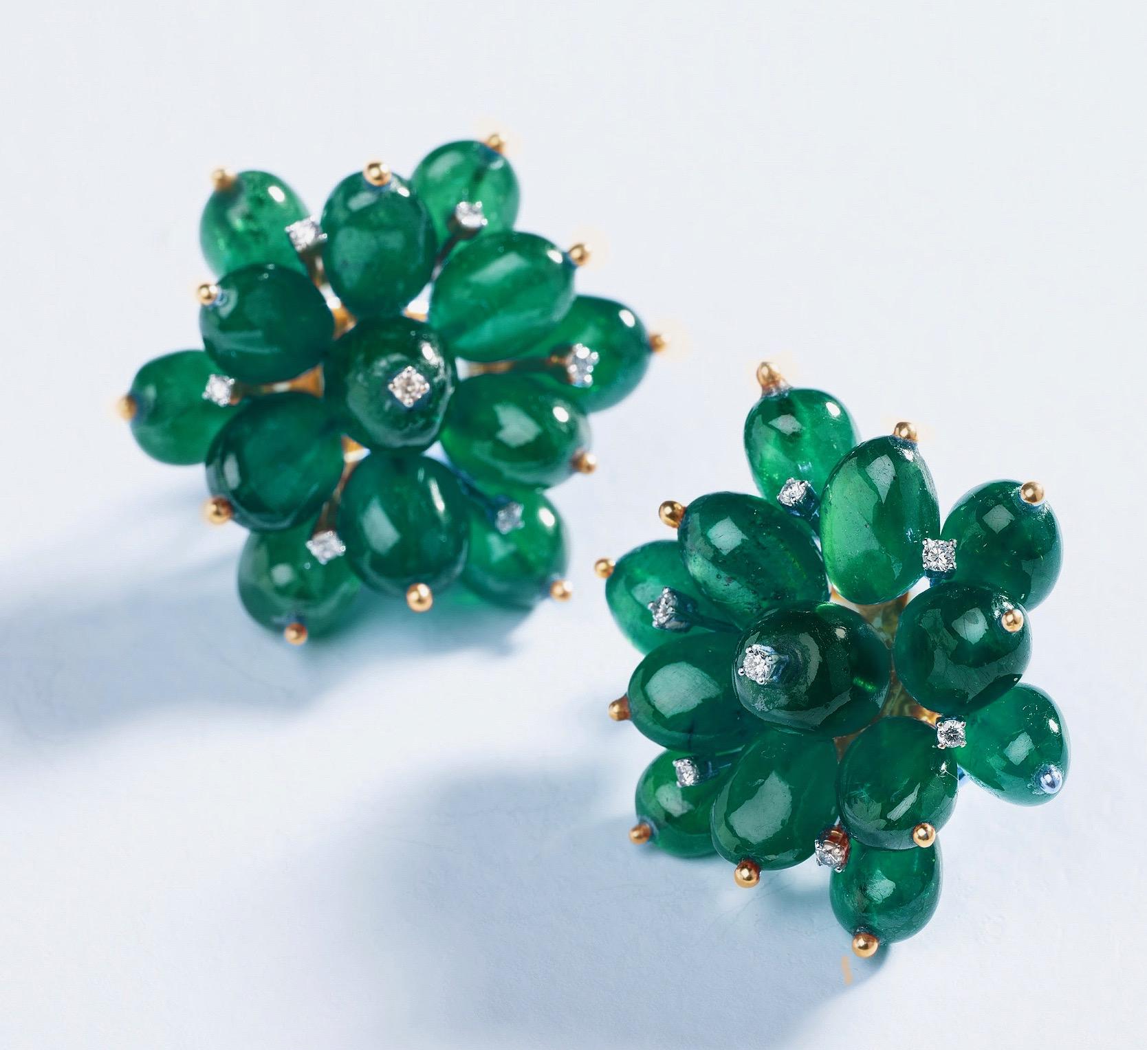 “Emerald Flower Earrings“

Push-back earrings crafted in 14kt Yellow Gold and set with 80 carats of Zambian Emeralds and 0.30 carats of brilliant-cut round diamonds. 