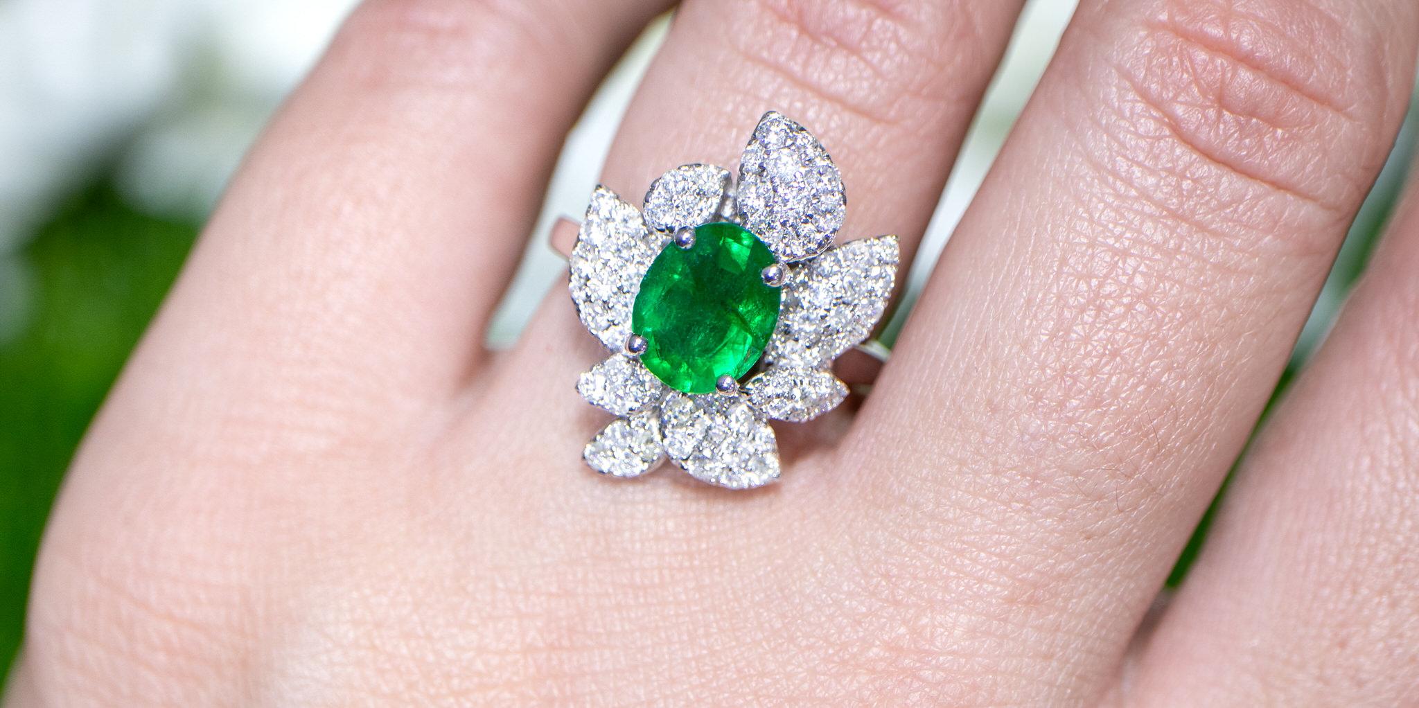Oval Cut Emerald Flower Ring With Diamonds 2.61 Carats 18K White Gold For Sale