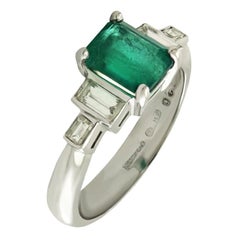 Emerald, Four White Baguette Cut Diamond Engagement Ring Set in 18 Karat Gold