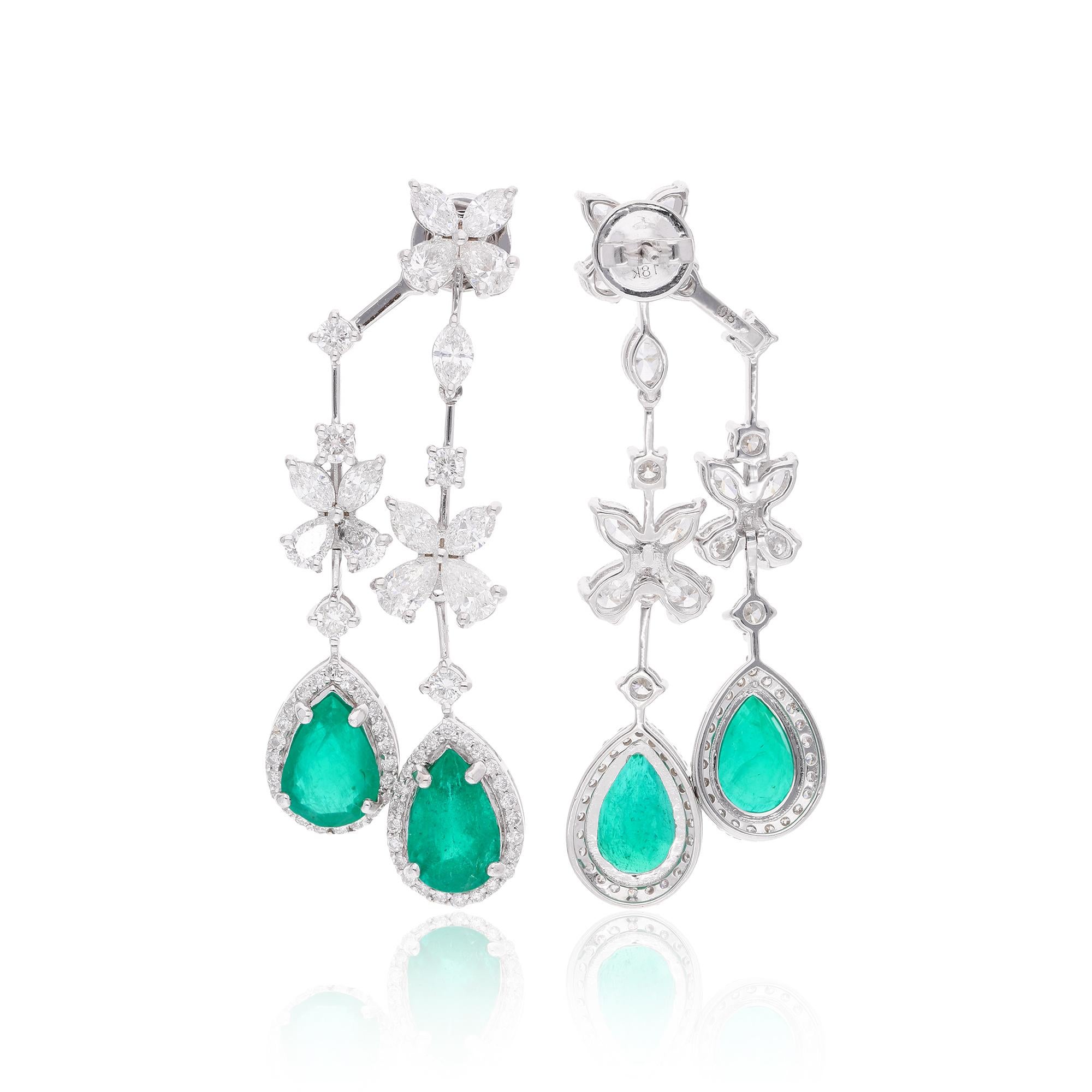 These Dainty Diamond Dangle Earrings with 5.48 ct. Genuine Diamonds & 6.95 ct. Zambian Emerald are a promise of perfection and purity. These earrings are set in 14k Solid White Gold. You can choose these earrings in 10k/14k/18k, Rose Gold/White