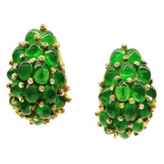 Emerald glass cabuchon and clear paste 'cluster' earrings, Marcel Boucher, 1960s