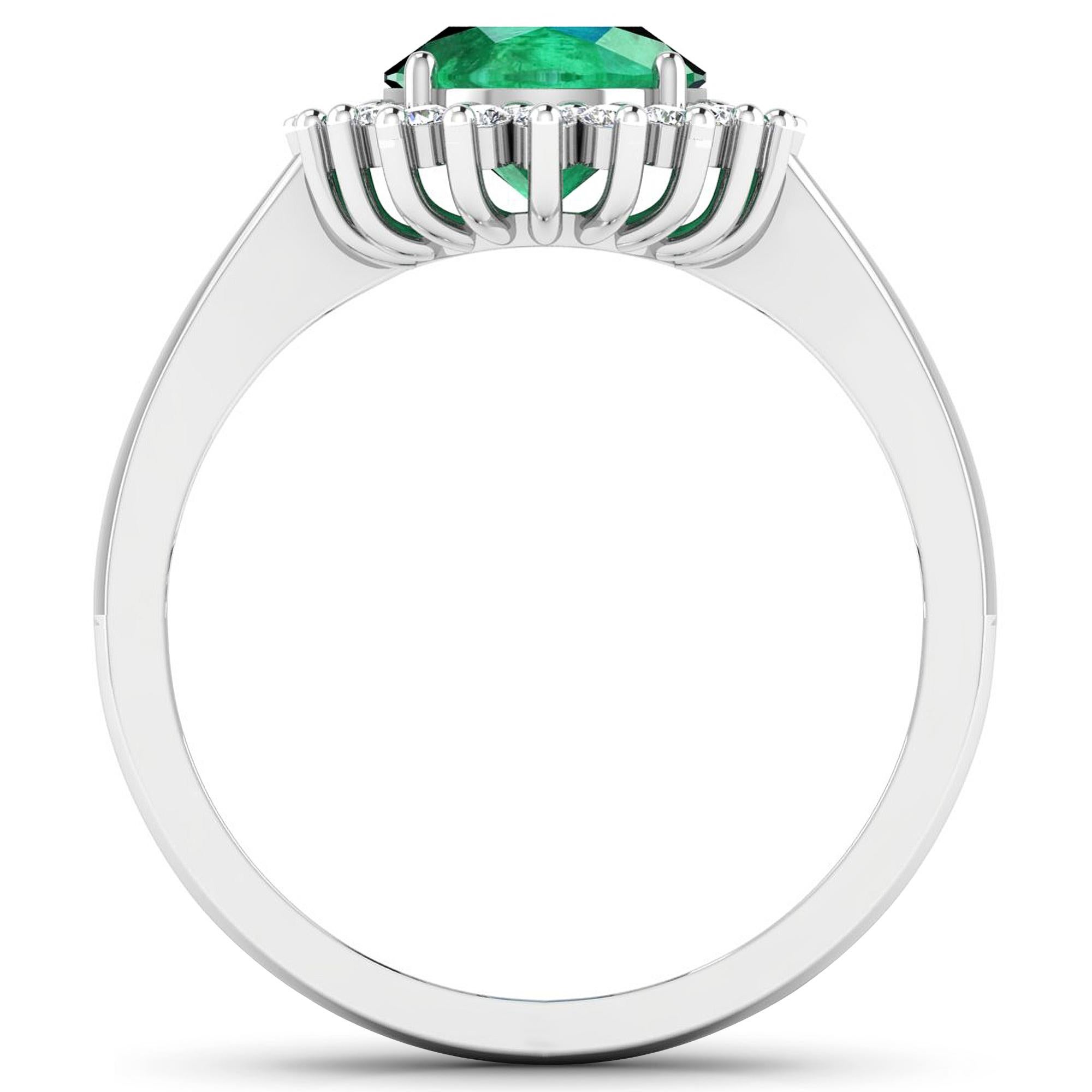 Emerald Gold Ring, 14Kt Gold Emerald & Diamond Engagement Ring, 1.29ctw.

Flaunt yourself with this 14K White Gold Emerald & White Diamond Engagement Ring. The setting is inlaid with 17 accented full-cut White Diamond round stones for a total stone