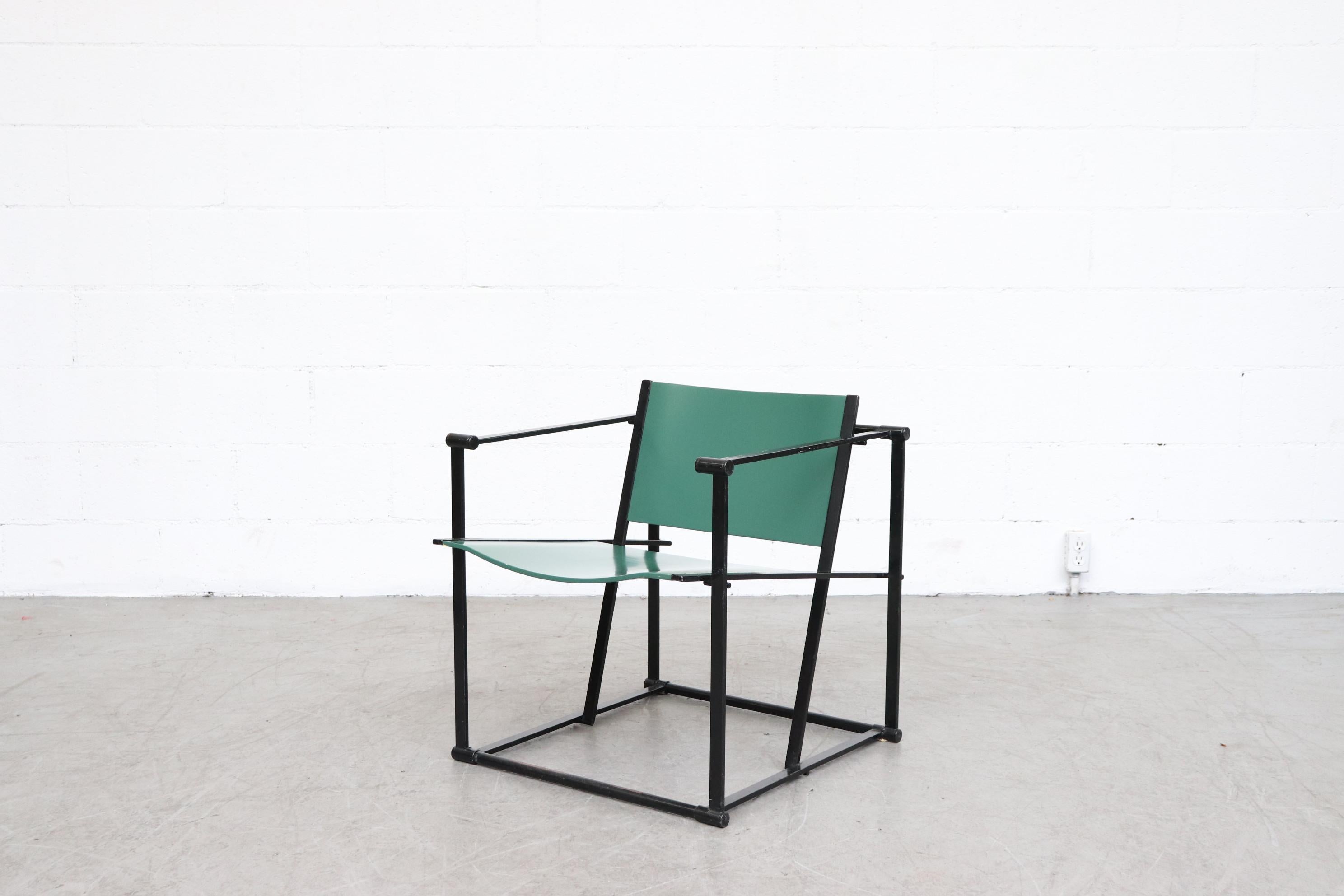 UMS Pastoe FM60, cubic chair lounge chair, designed in 1980 by Radboud van Beekum for Pastoe. Black enameled steel frame with green painted molded wood seating. Frame is in original condition with some wear to enamel. Some wear and minimal chipping
