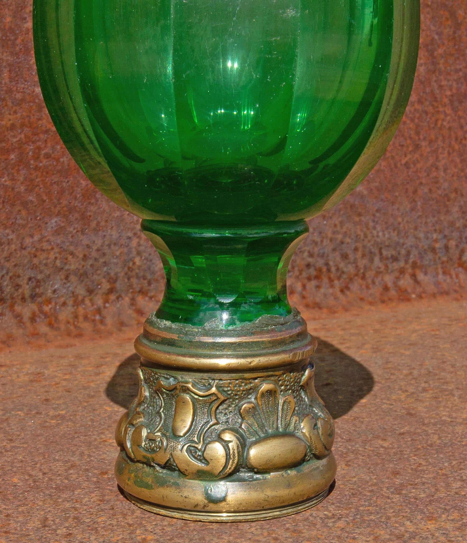 Emerald green cut glass newel post finial with brass mount, 19th century. Measures: 8.5