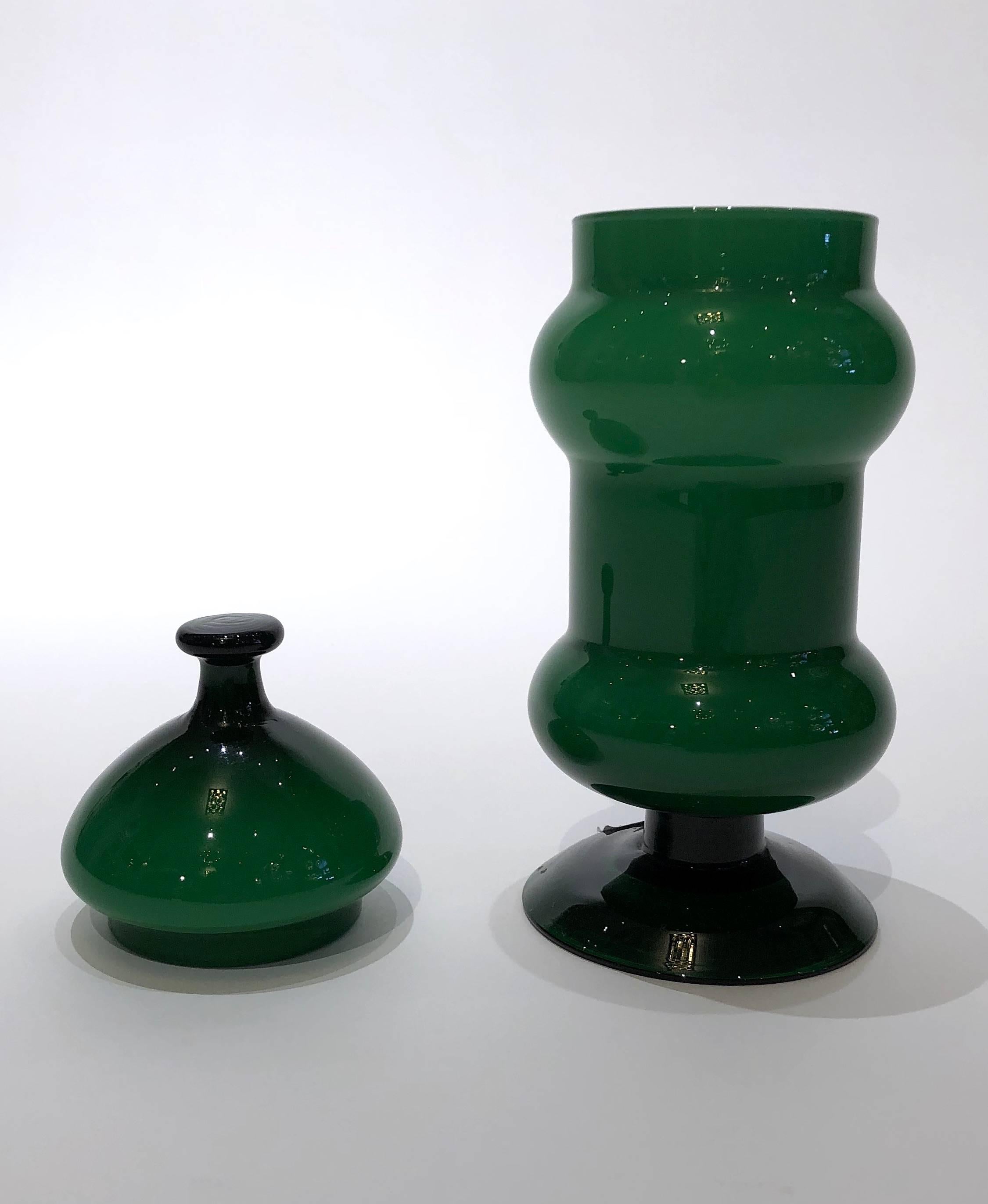 1970s emerald green cast glass vase with lid.